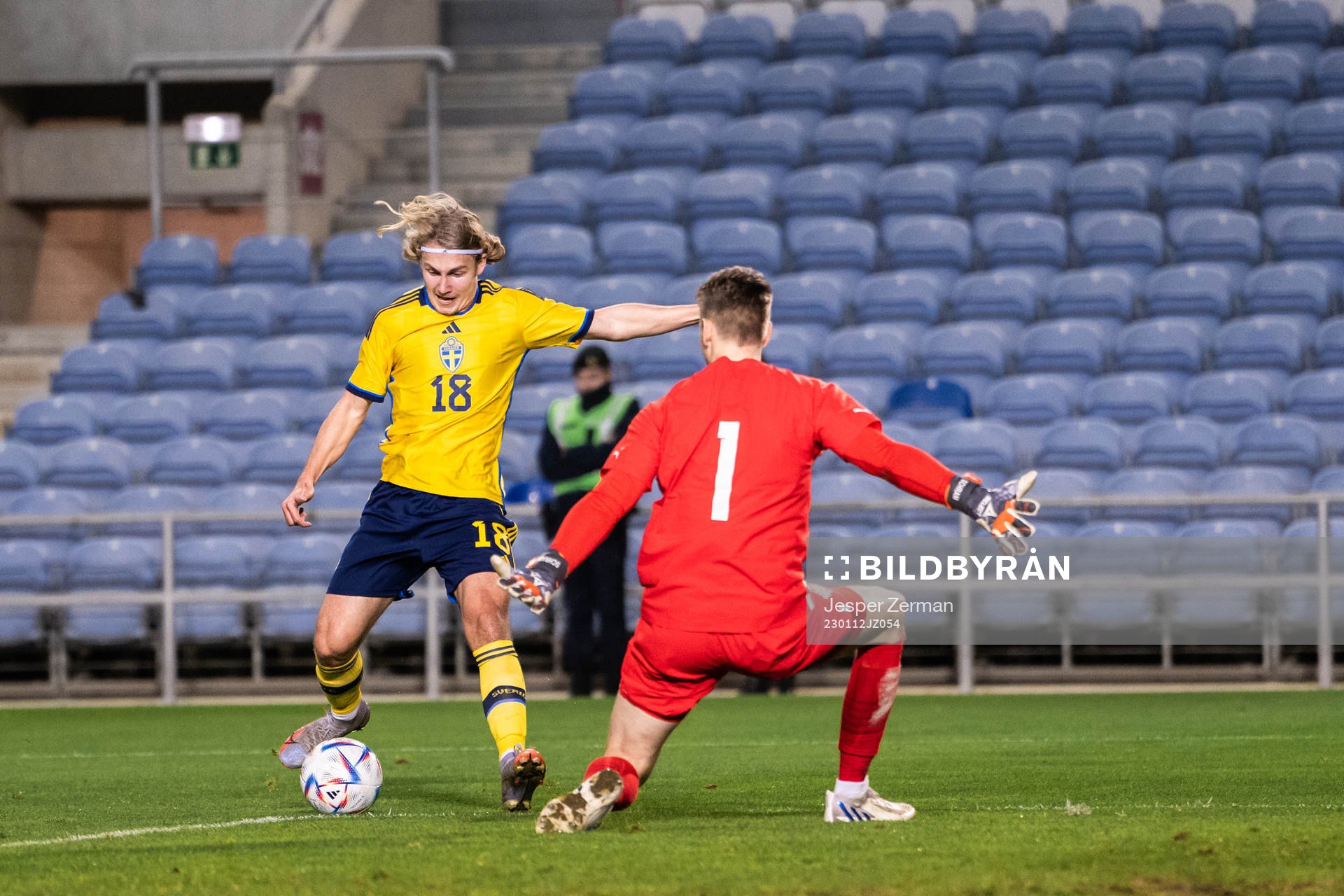 Sebastian Nanasi of Sweden and goalkeeper Fredrik Schram of