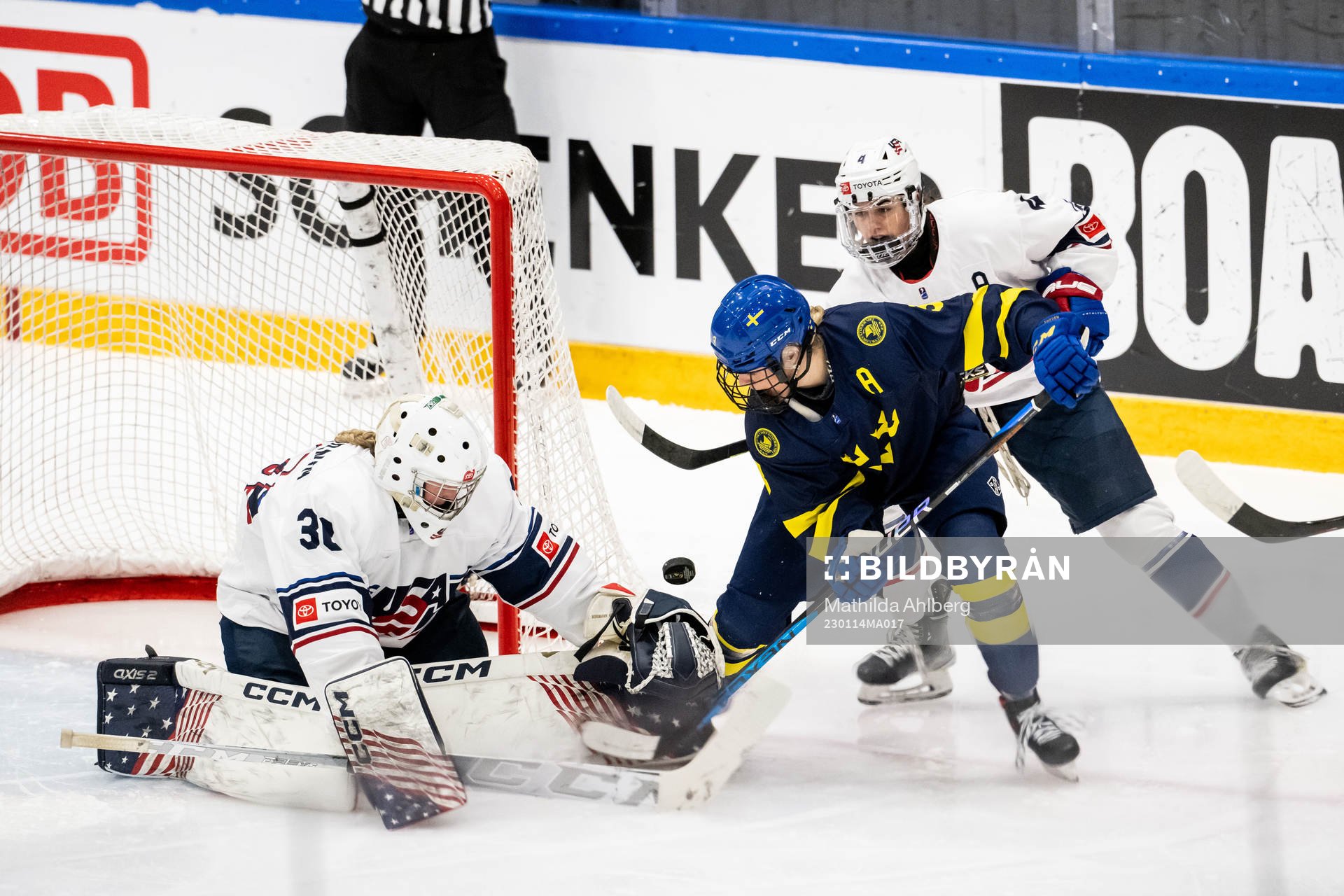 Mira Jungåker of Sweden against goaltender Annelies