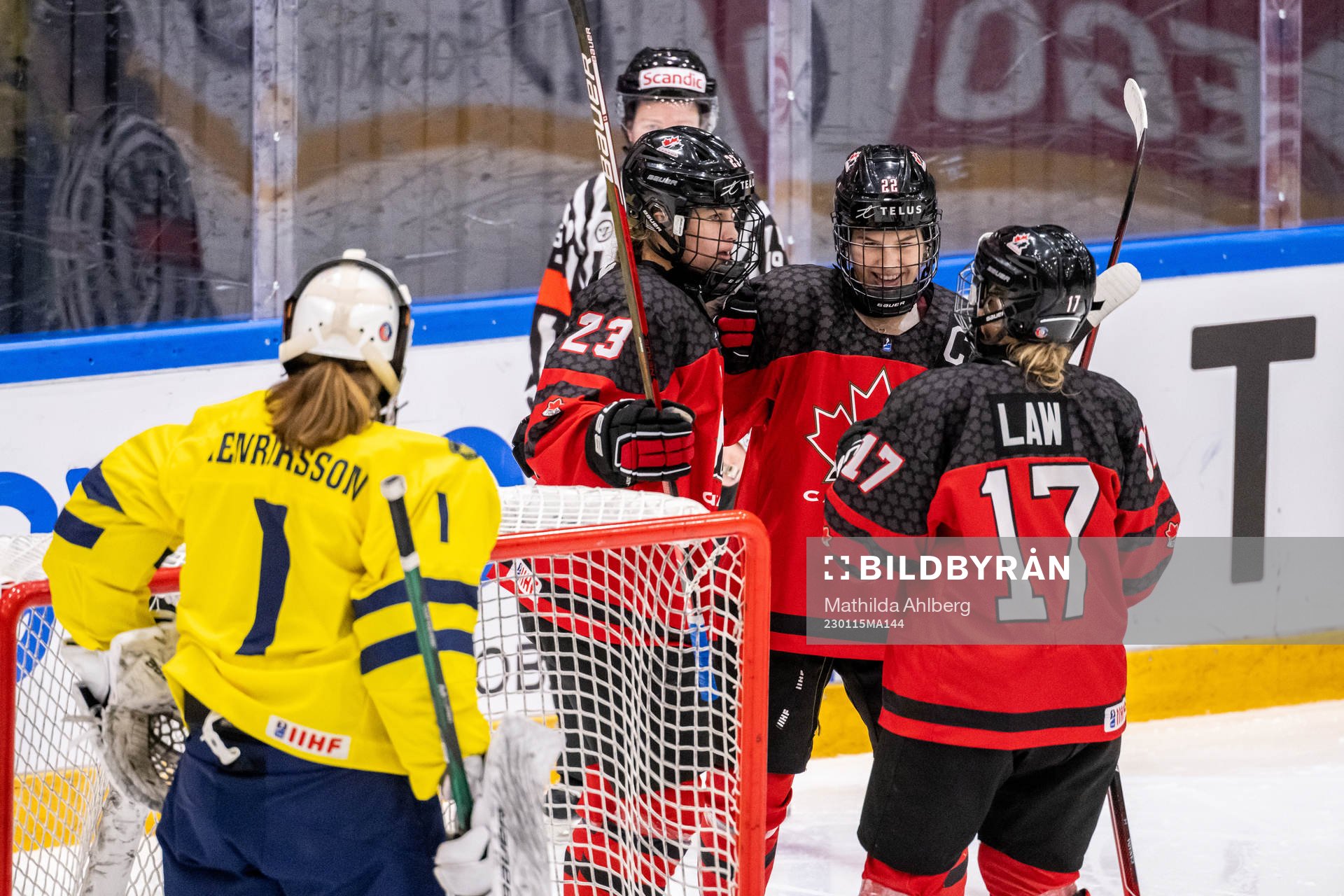 Caitlin Kraemer and Jocelyn Amos of Canada celebrate the