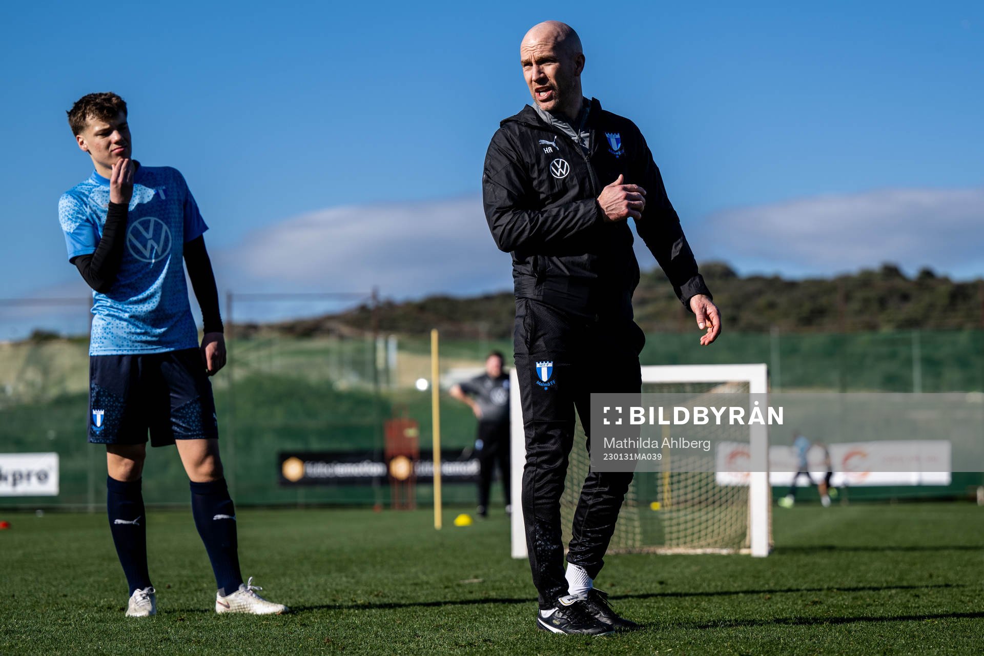 August Karlin och tränare Henrik Rydström