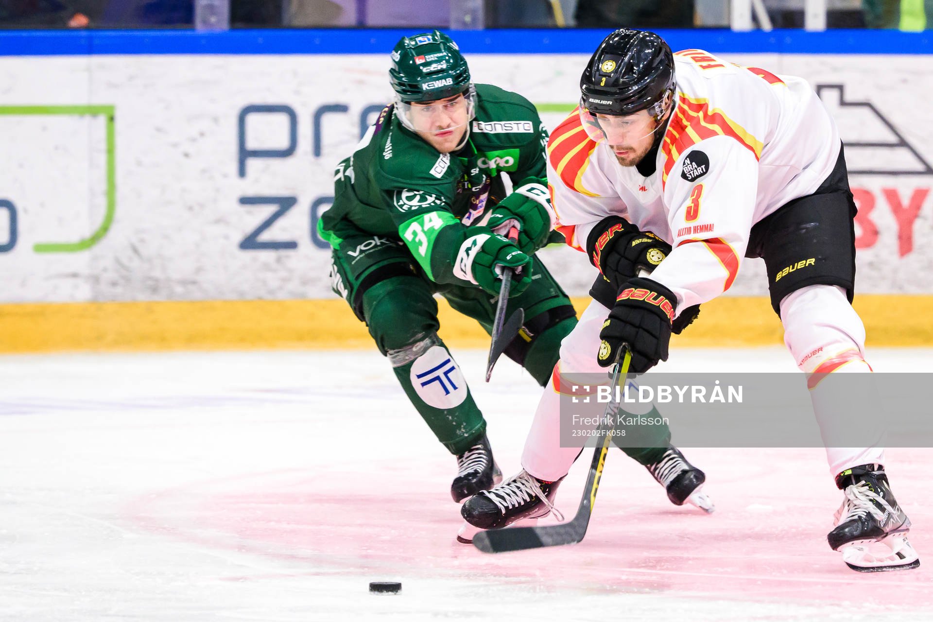 Färjestads Michael Lindqvist och Brynäs Niklas Friman