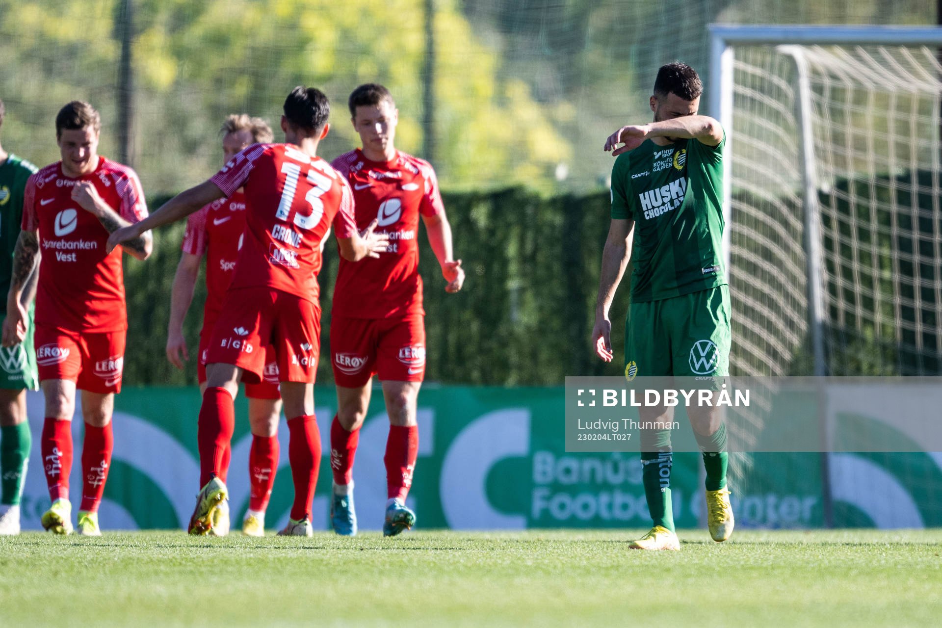 Players of Brann celebrate and Abdelrahman Saidi of