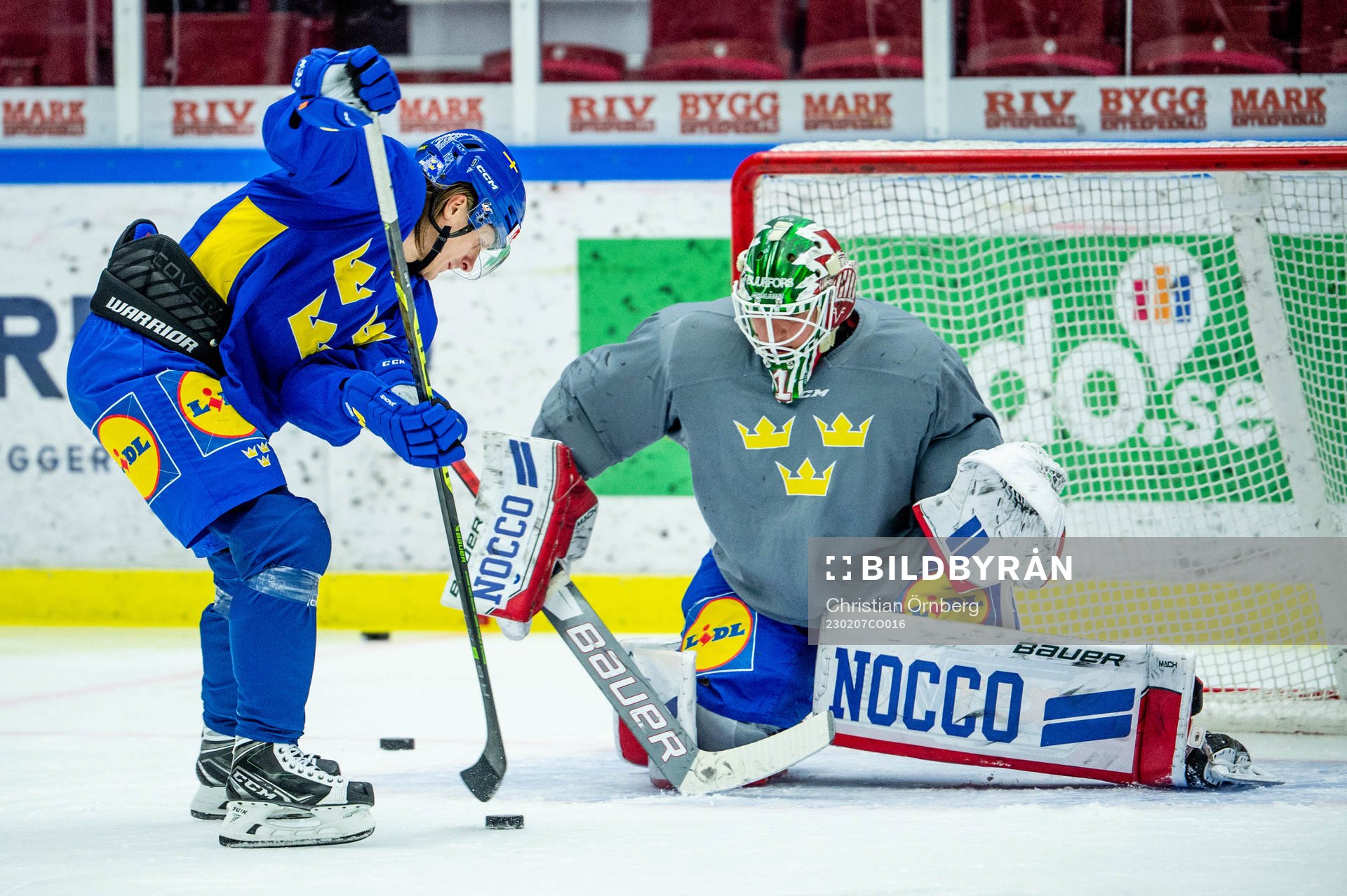 Marcus Sörensen and goalkeeper Lars Johansson of Sweden at