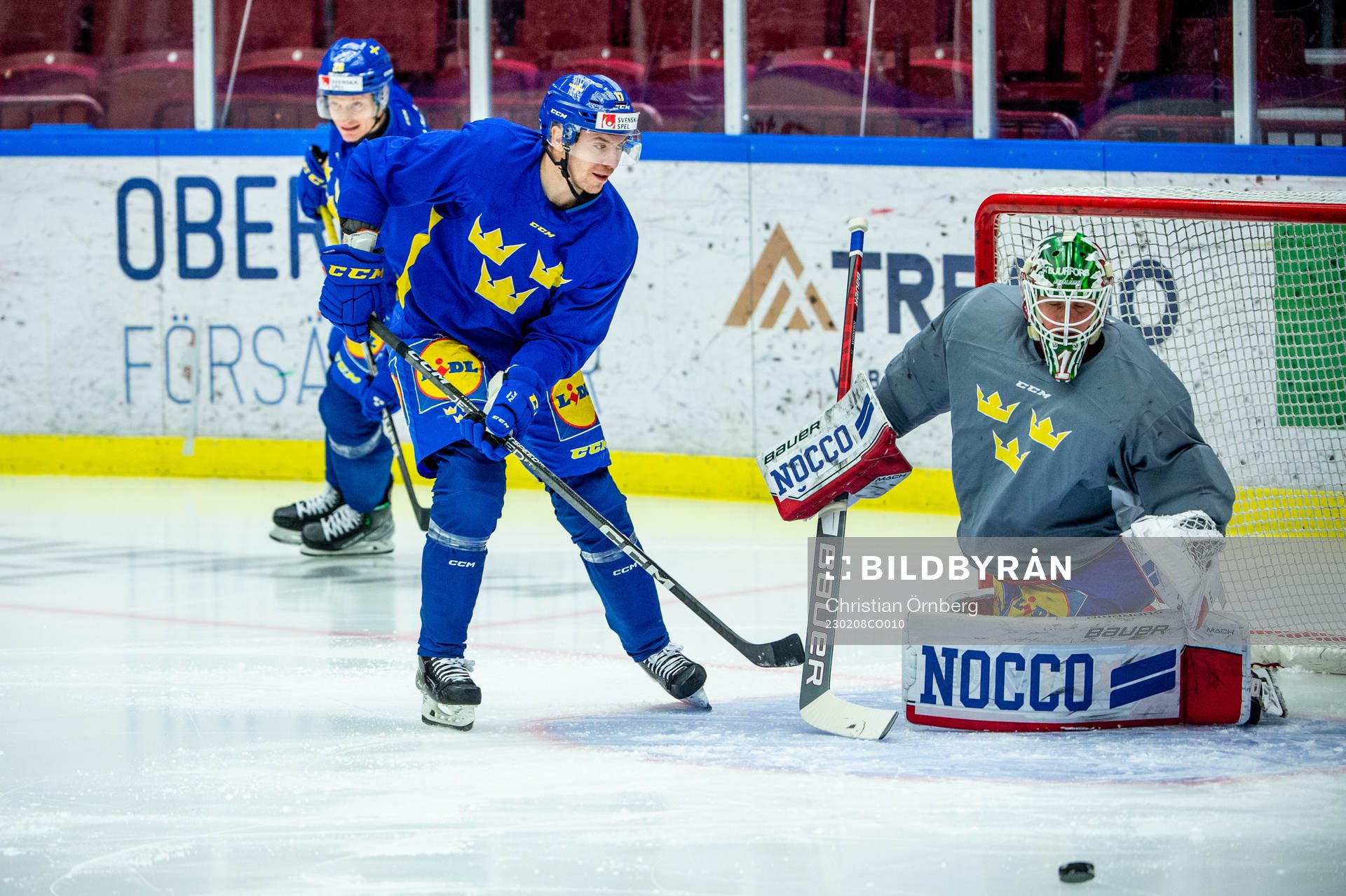 Pär Lindholm and goalkeeper Lars Johansson of Sweden at a