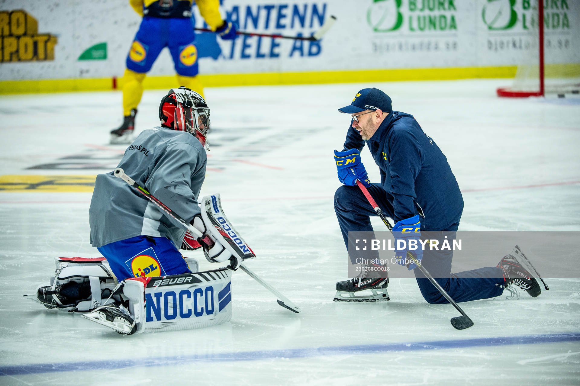 Goalkeeper Jhonas Enroth and goalie coach Stefan Ladhe of