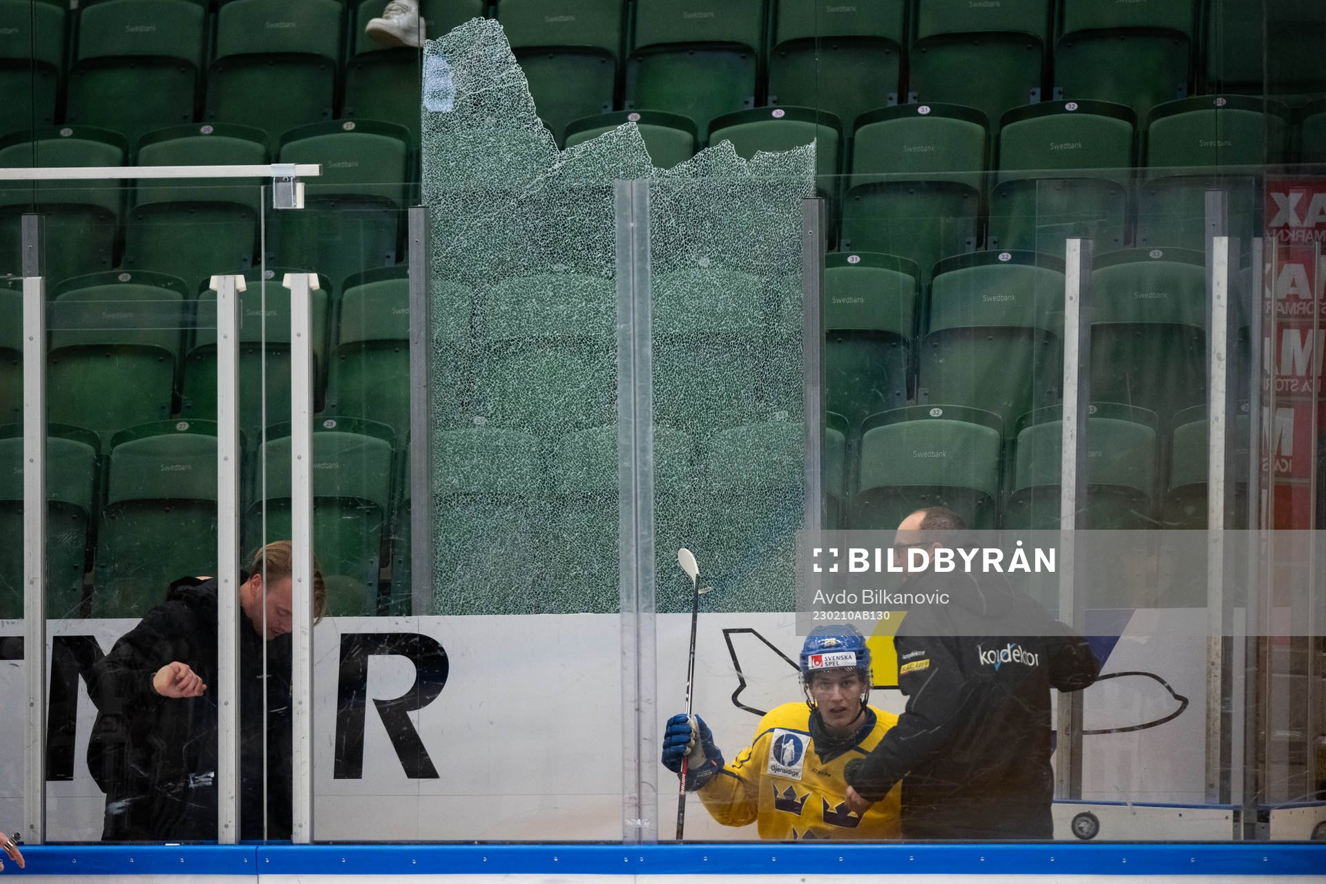 Crashed glass behind Erik Påhlsson of Sweden