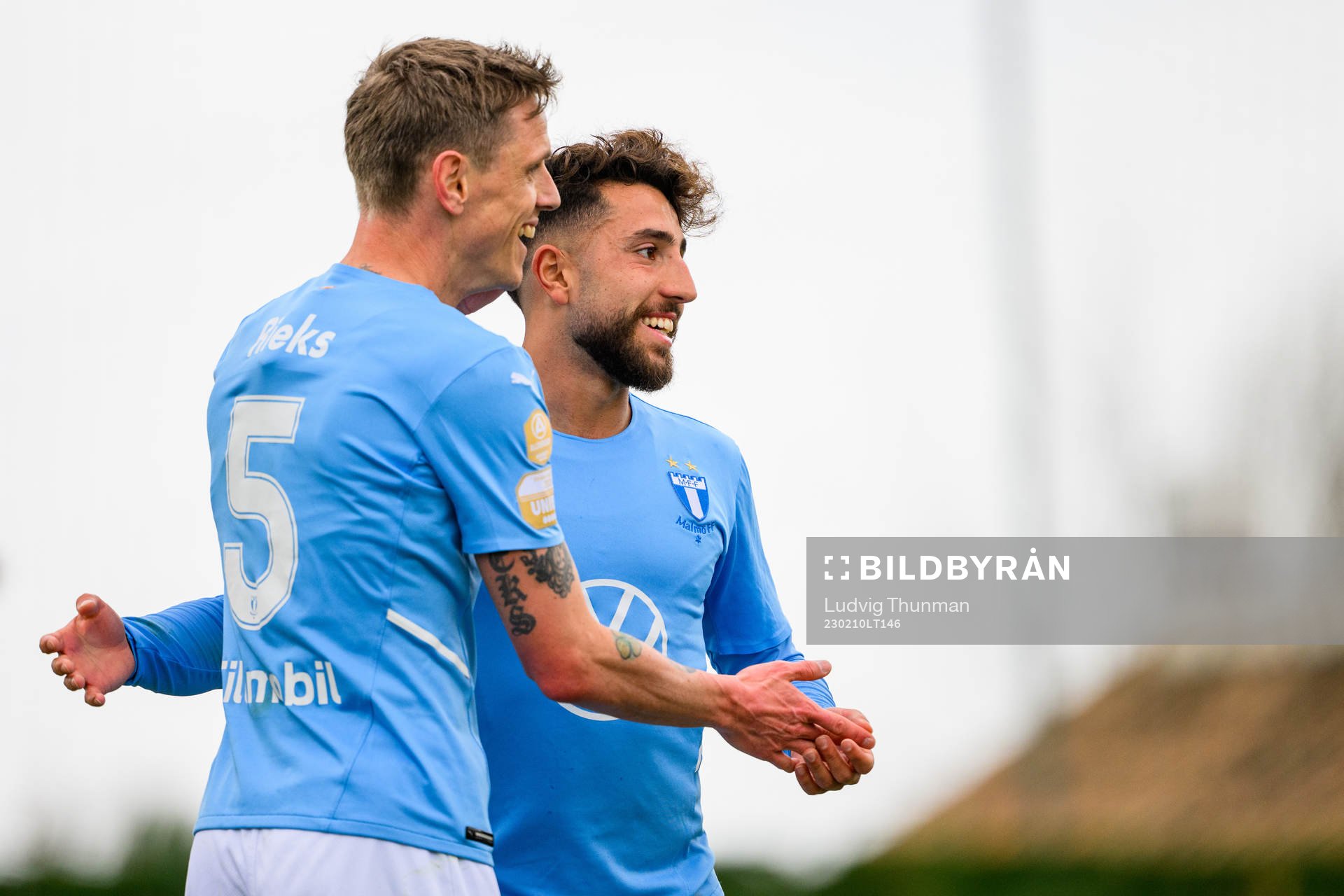Søren Rieks celebrates with Moustafa Zeidan of Malmö FF