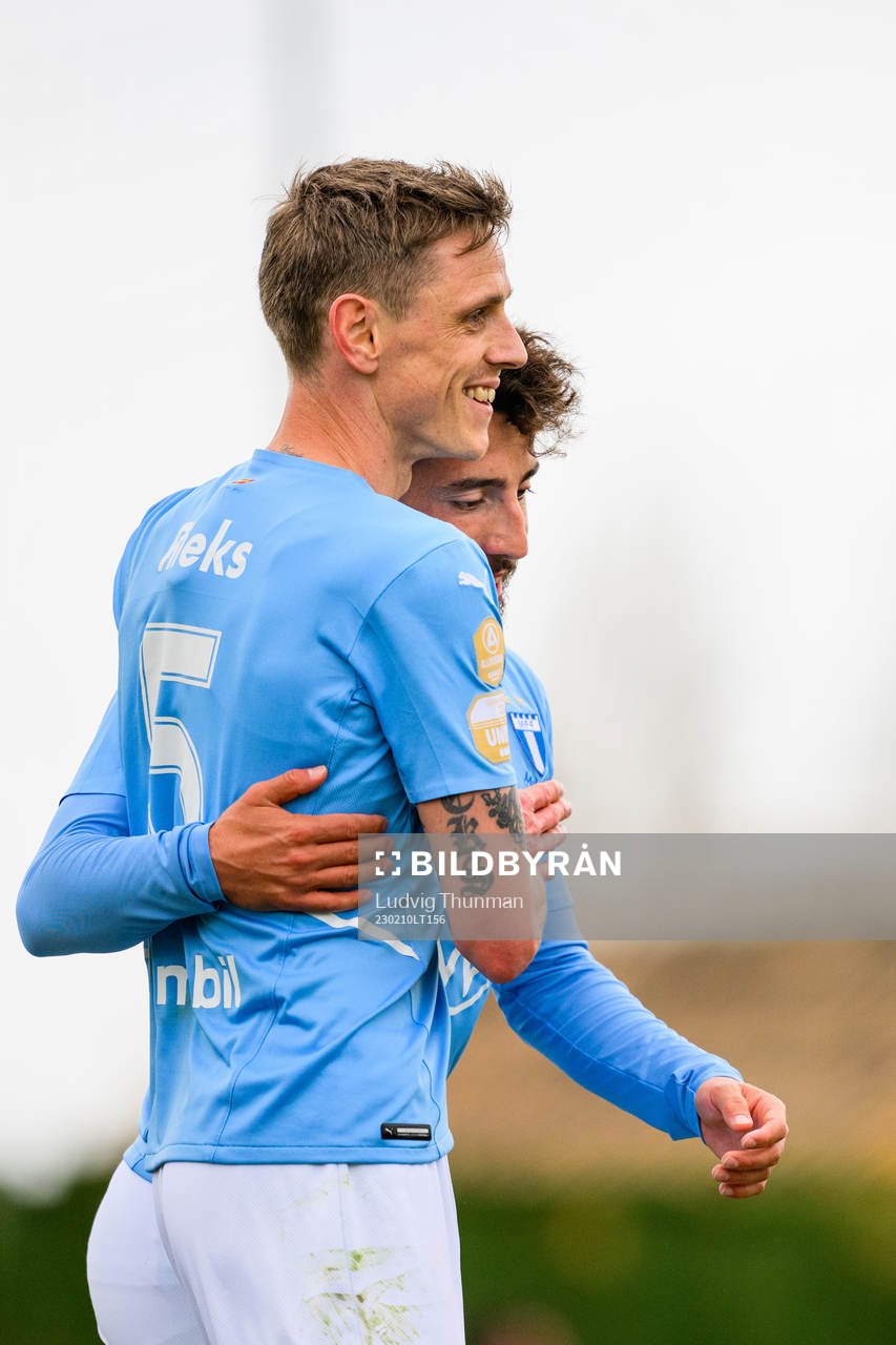 Søren Rieks celebrates with Moustafa Zeidan of Malmö FF