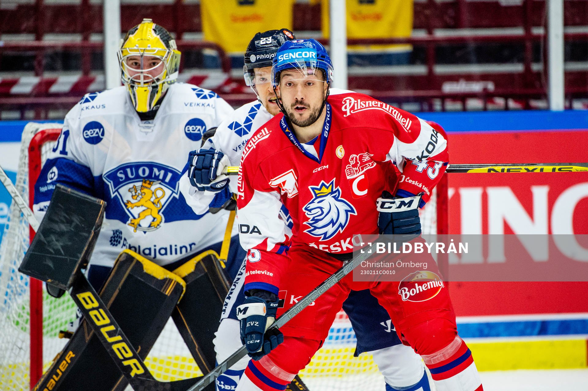 Julius Mattila and goaltender Juha Jatkola of Finland and