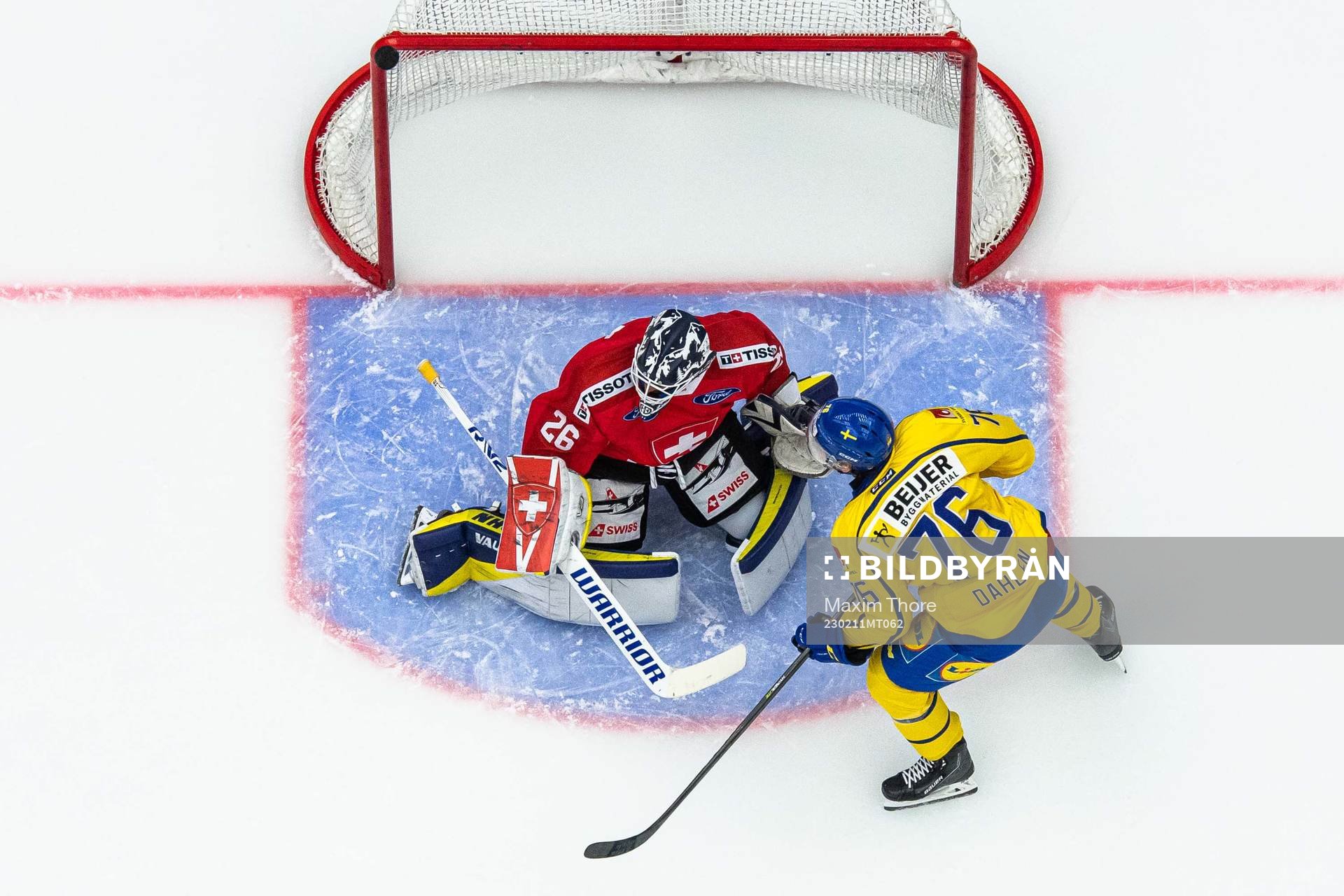 Goaltender Sandro Aeschlimann of Switzerland and Jonathan