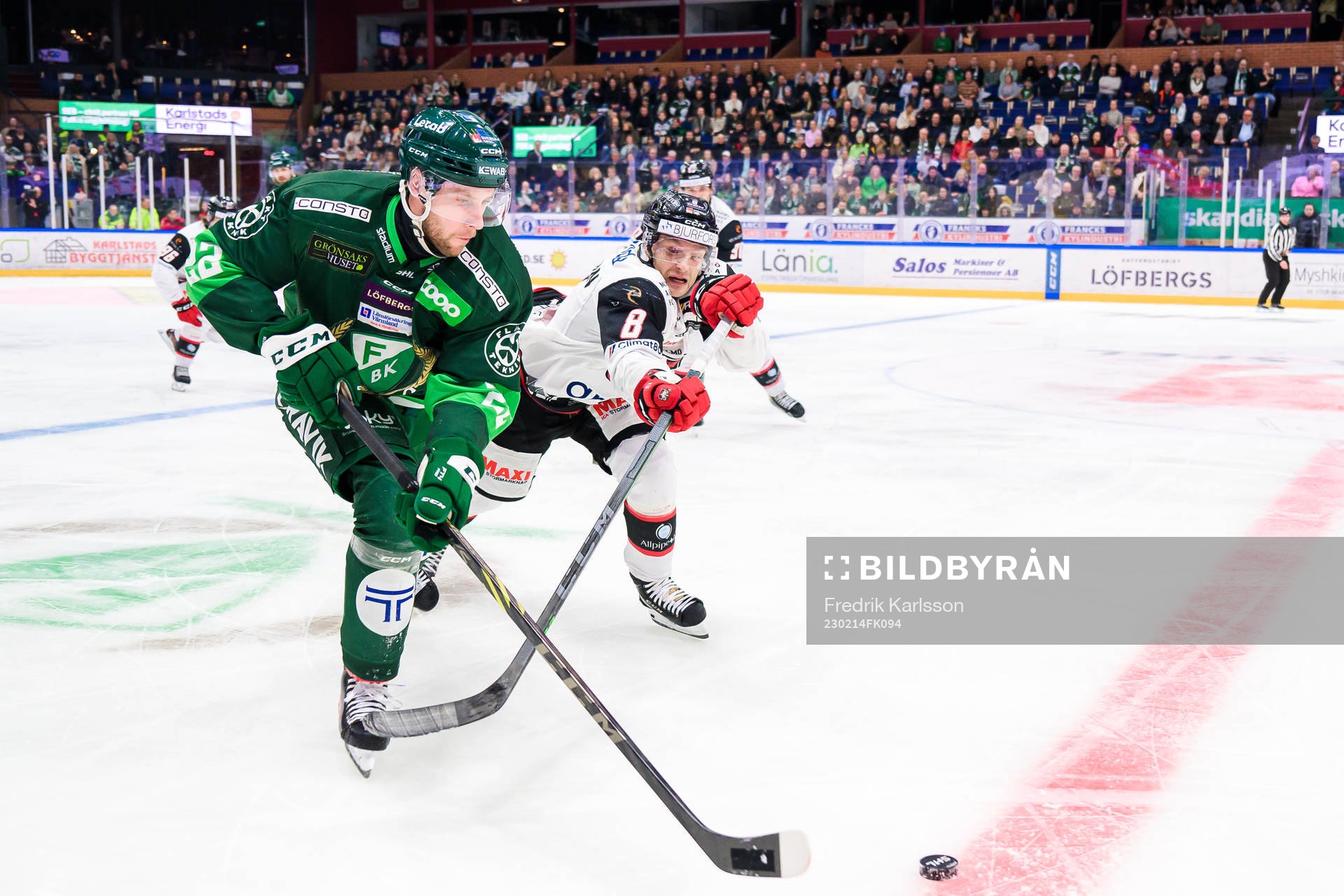 Färjestads Per Åslund och Malmö Redhawks Johan Olofsson