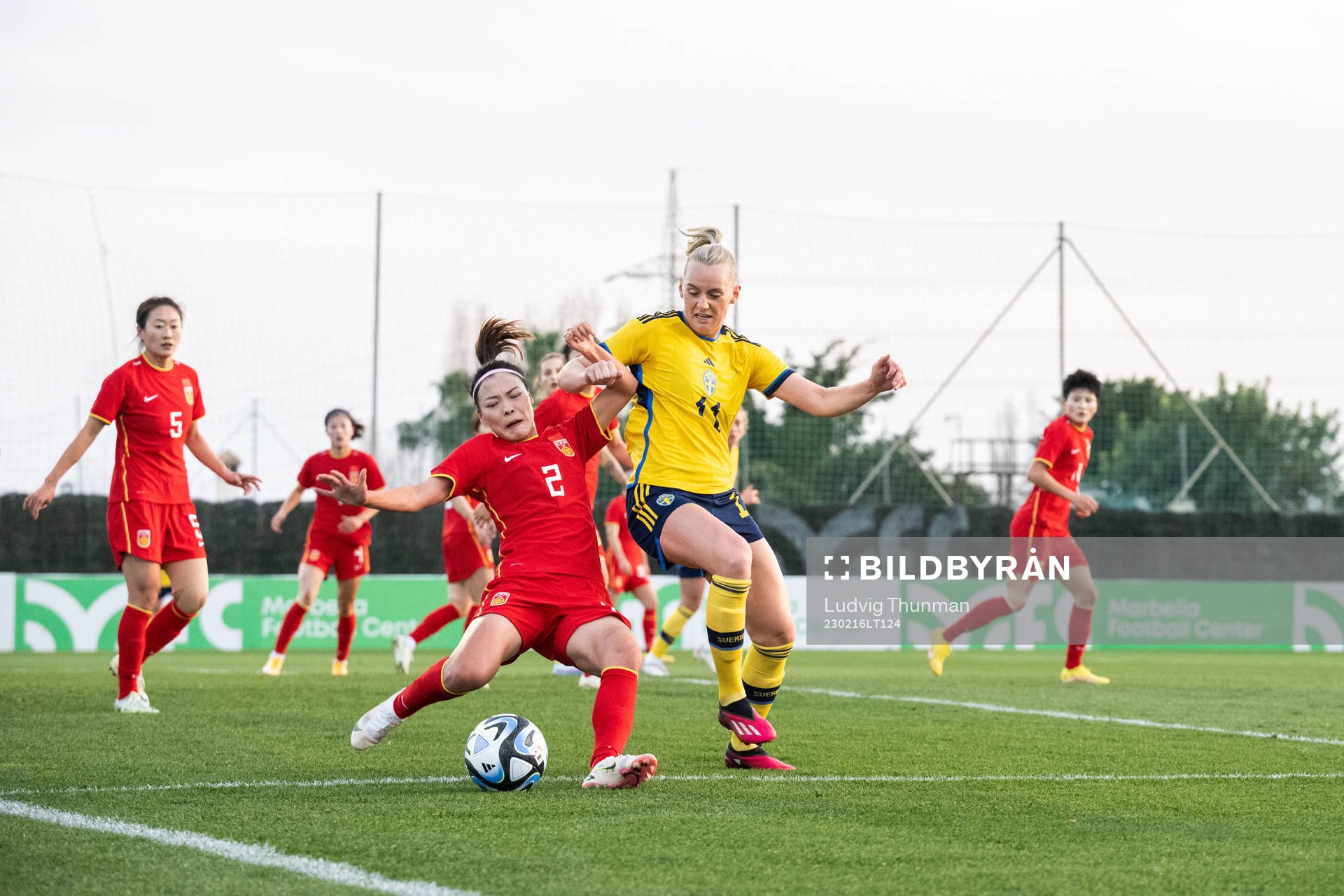 Li Mengwen of China and Stina Blackstenius of Sweden