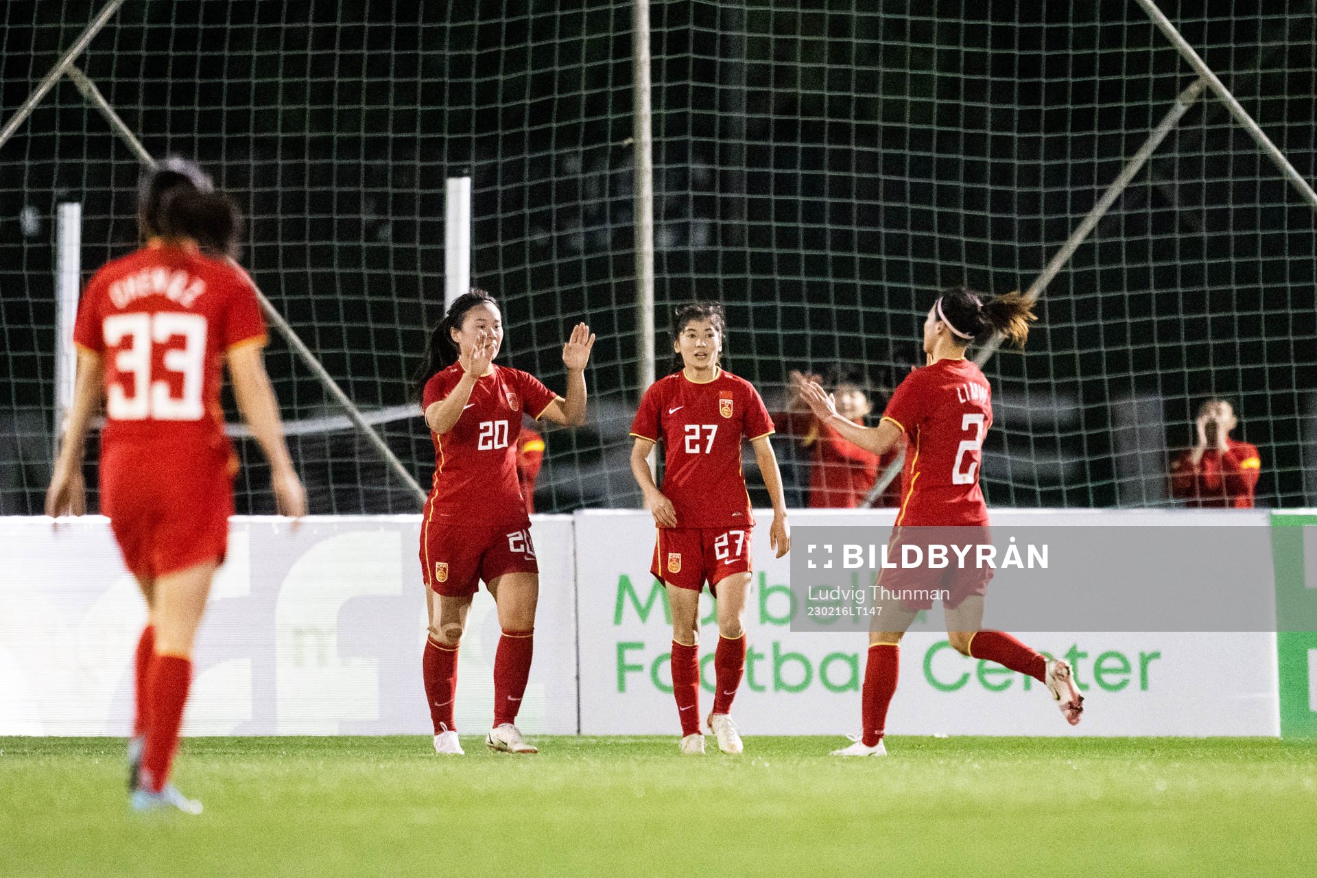 Players of China celebrate