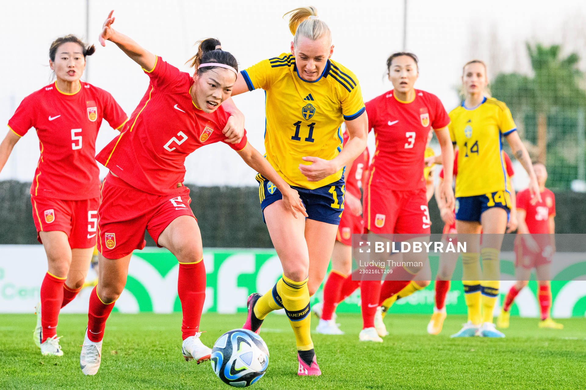 Li Mengwen of China and Stina Blackstenius of Sweden
