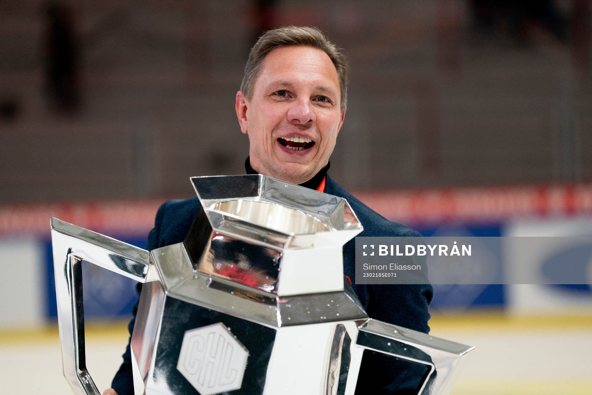 Tapparas coach Jussi Tapola celebrates with the trophy