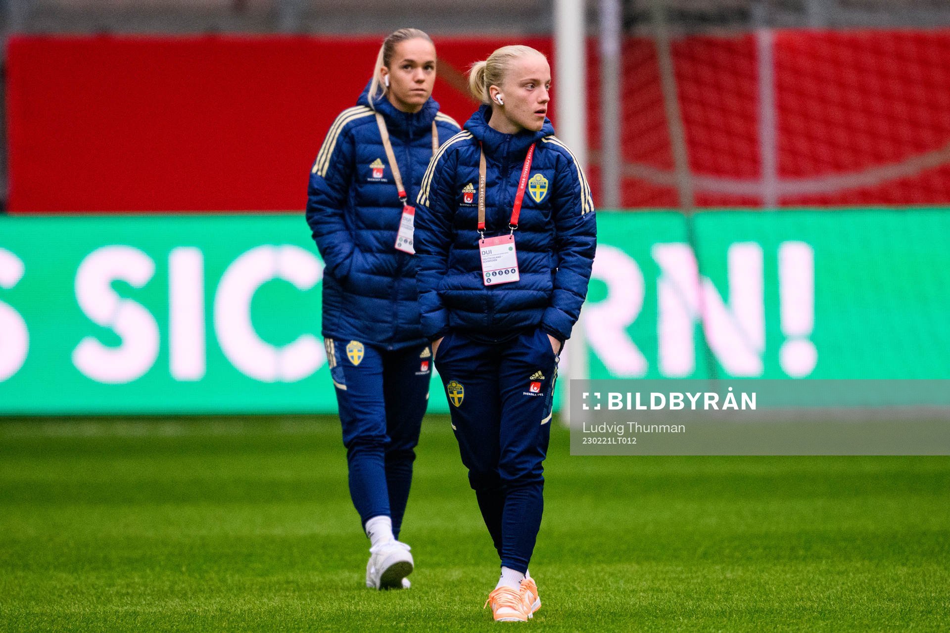 Hanna Lundkvist and Anna Sandberg of Sweden walks the pitch