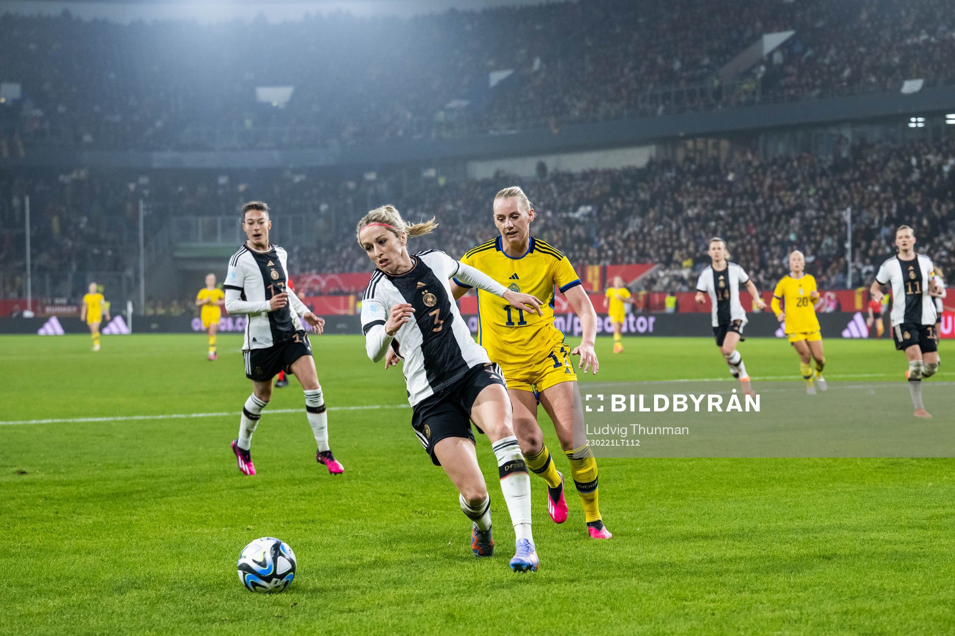 Kathrin Hendrich of Germany and Stina Blackstenius of Sweden