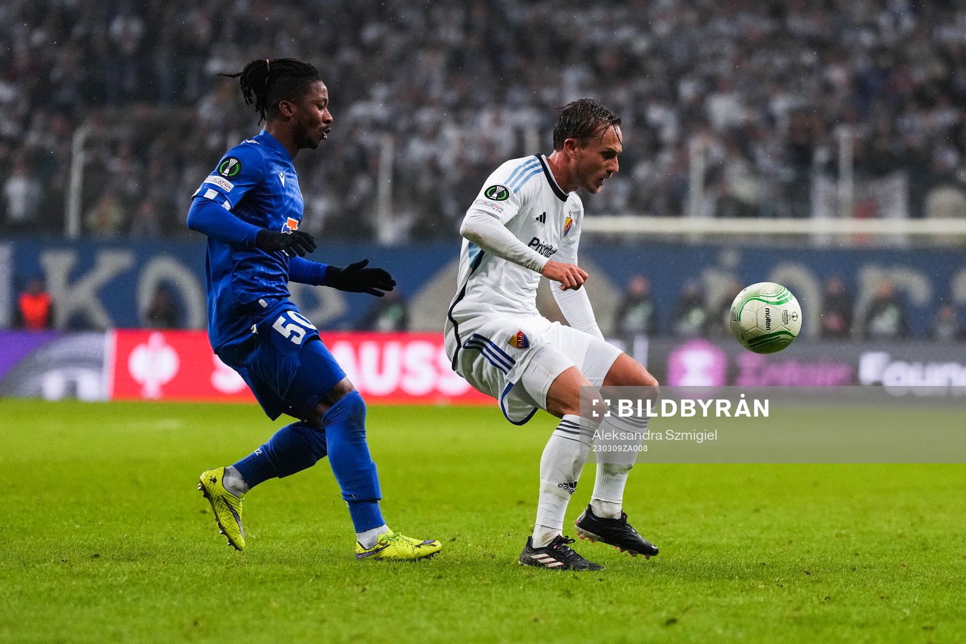 Adriel Ba Loua of Lech Poznan and Pierre Neurath Bengtsson