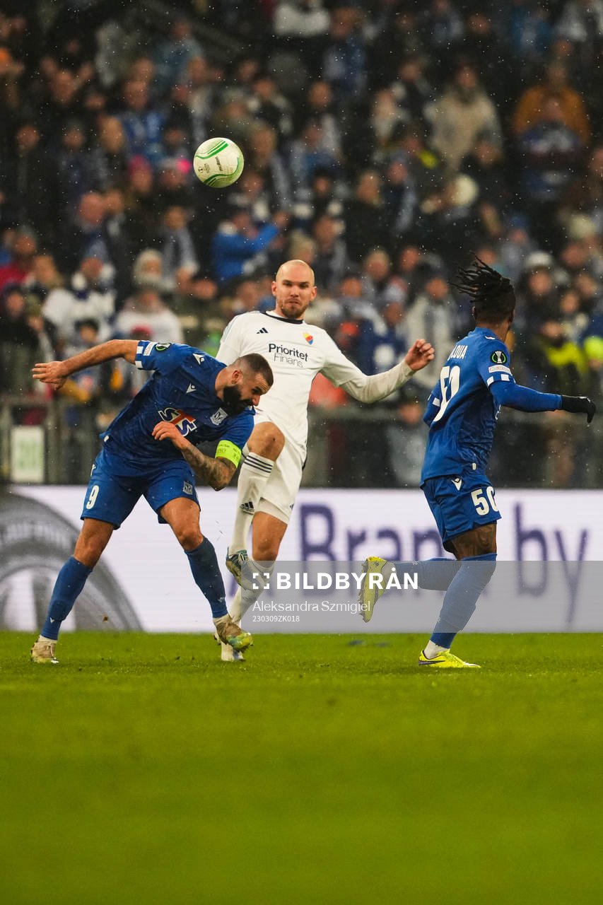 Mikael Ishak of Lech Poznan and Marcus Danielson of