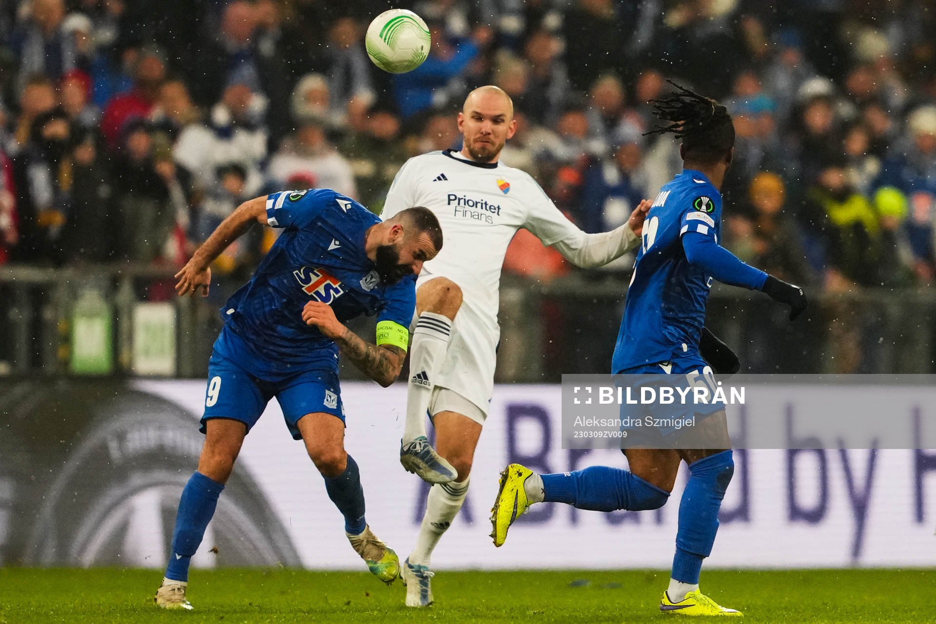 Mikael Ishak of Lech Poznan and Marcus Danielson of