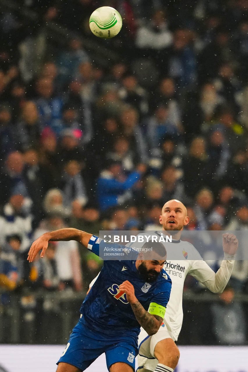 Mikael Ishak of Lech Poznan and Marcus Danielson of