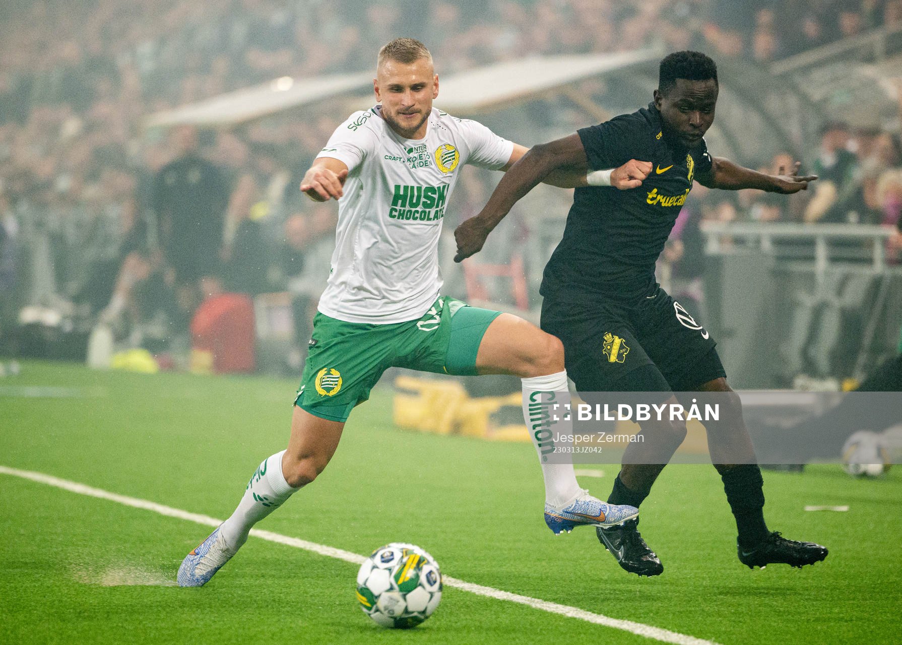 Hammarbys Simon Strand och AIKs Erick Otieno