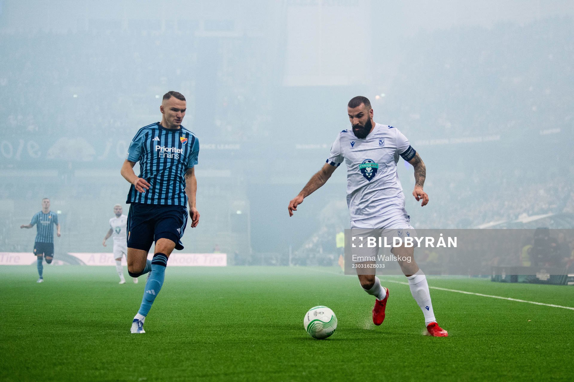 Piotr Johansson of Djurgården and Mikael Ishak of Lech