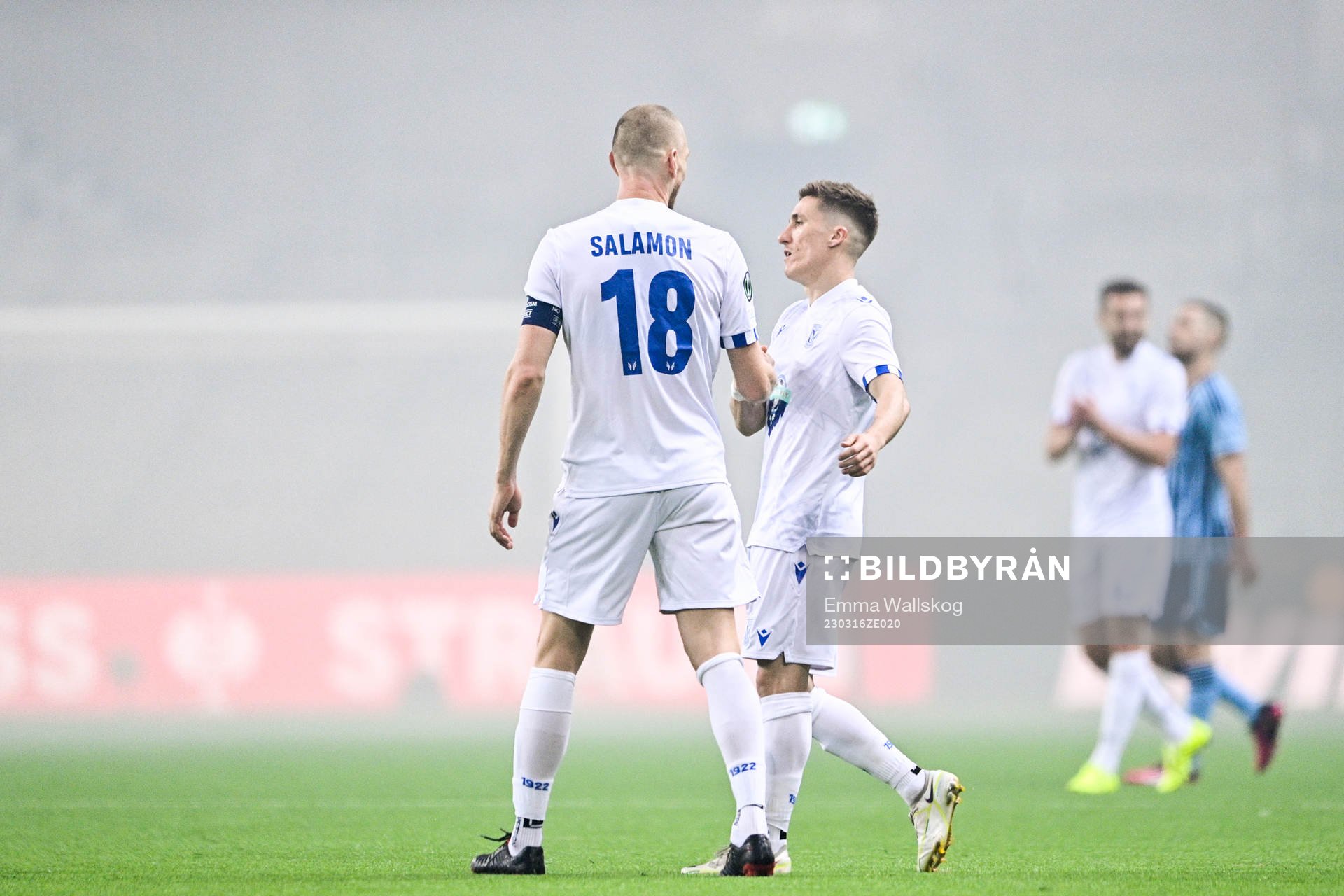 Bartosz Salamon and Joel Pereira of Lech Poznan celebrate