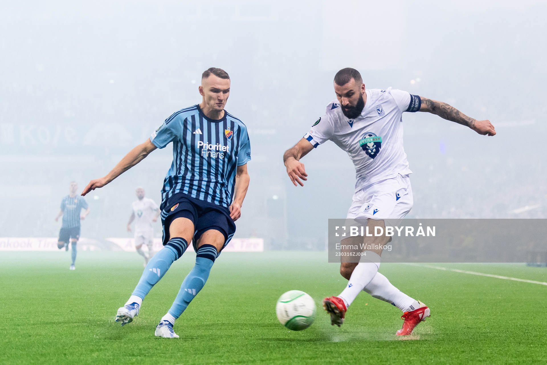 Piotr Johansson of Djurgården and Mikael Ishak of Lech