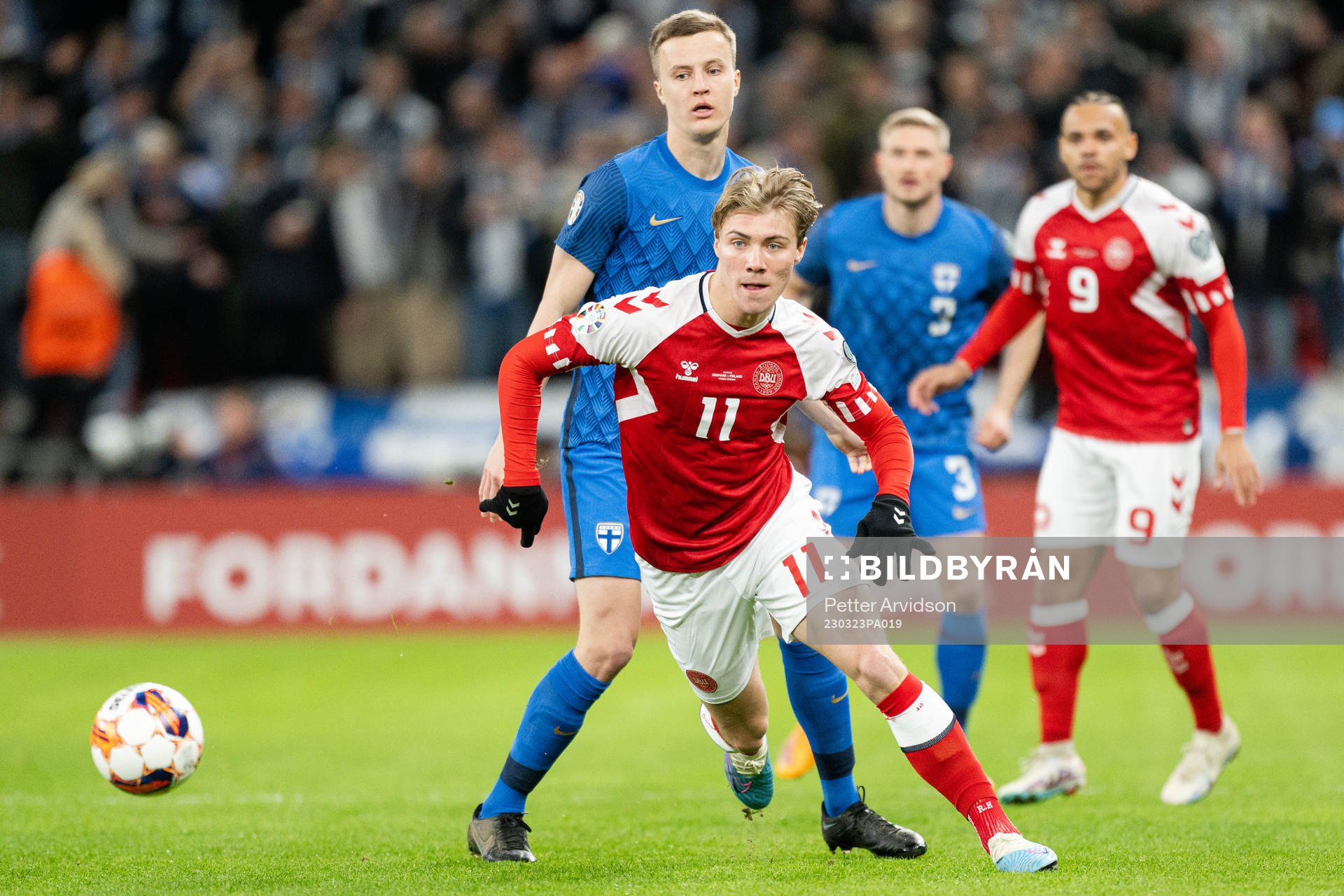 Rasmus Højlund of Denmark and Robert Ivanov of Finland