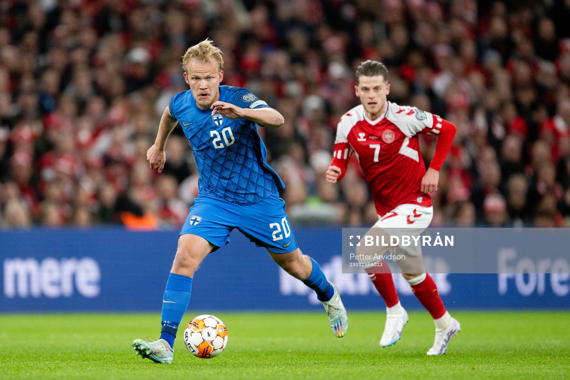 Joel Pohjanpalo of Finland and Mathias Jensen of Denmark