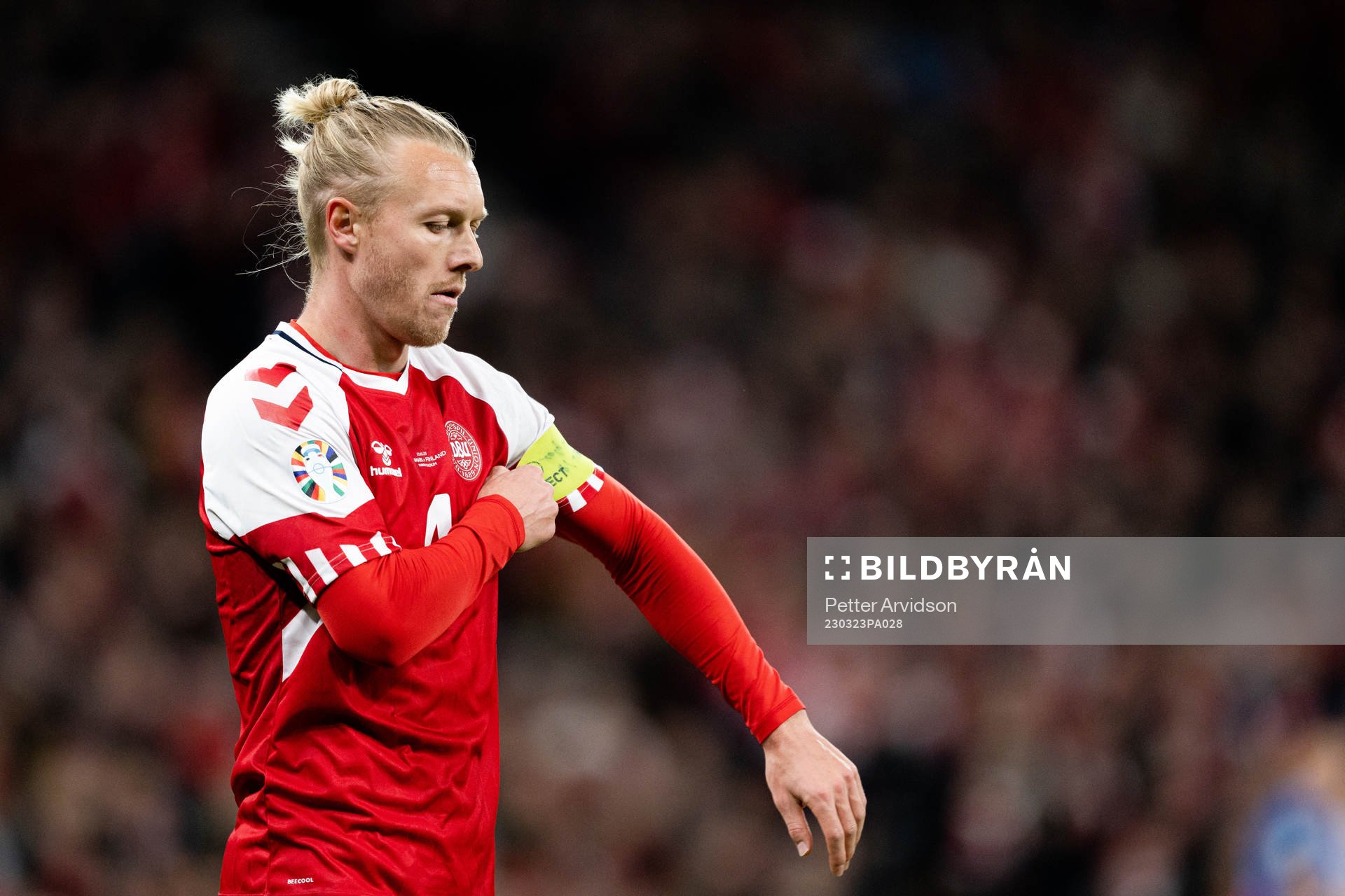 Simon Kjær of Denmark looks dejected