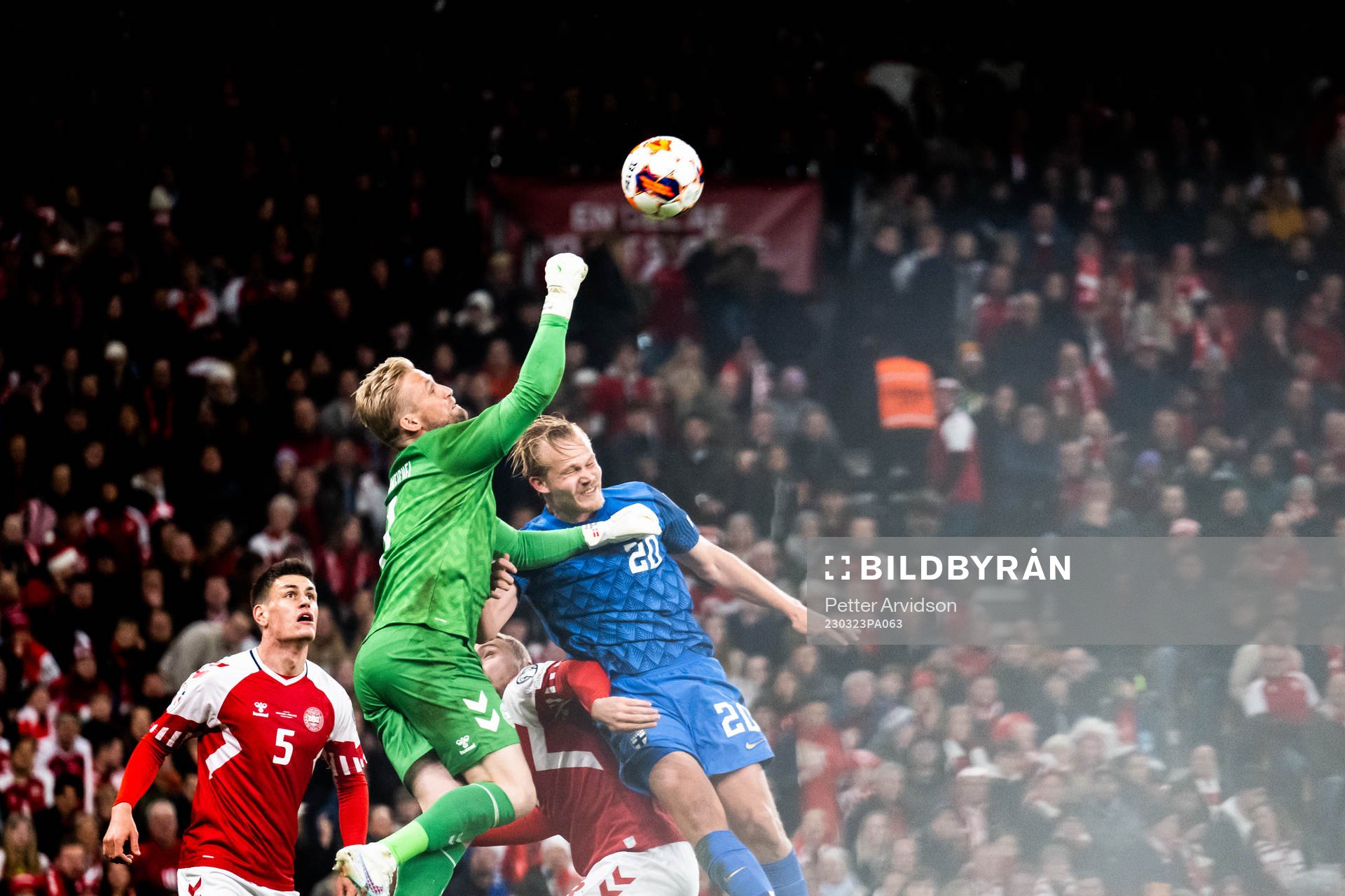 Goalkeeper Kasper Schmeichel of Denmark and Joel Pohjanpalo