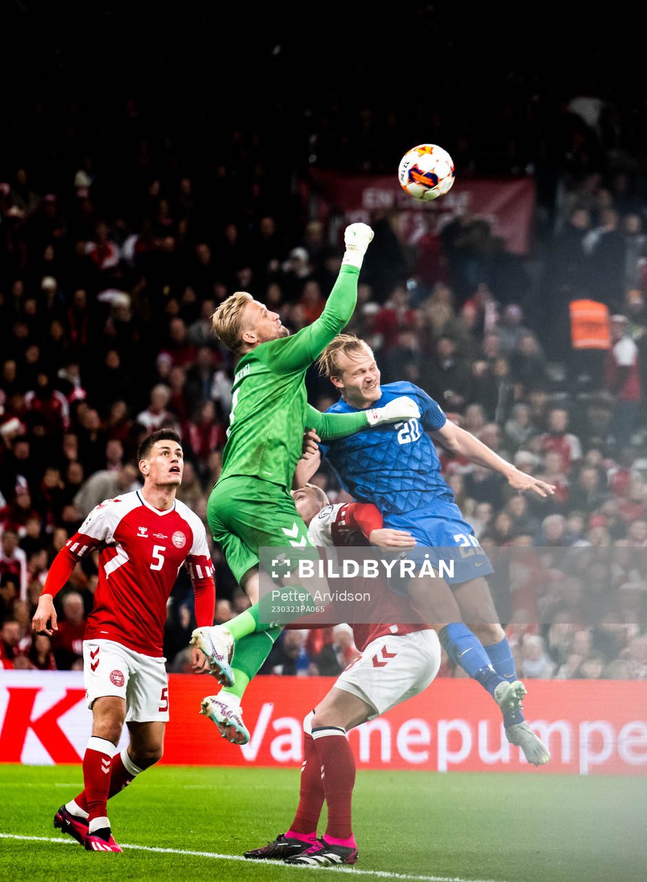 Goalkeeper Kasper Schmeichel of Denmark and Joel Pohjanpalo