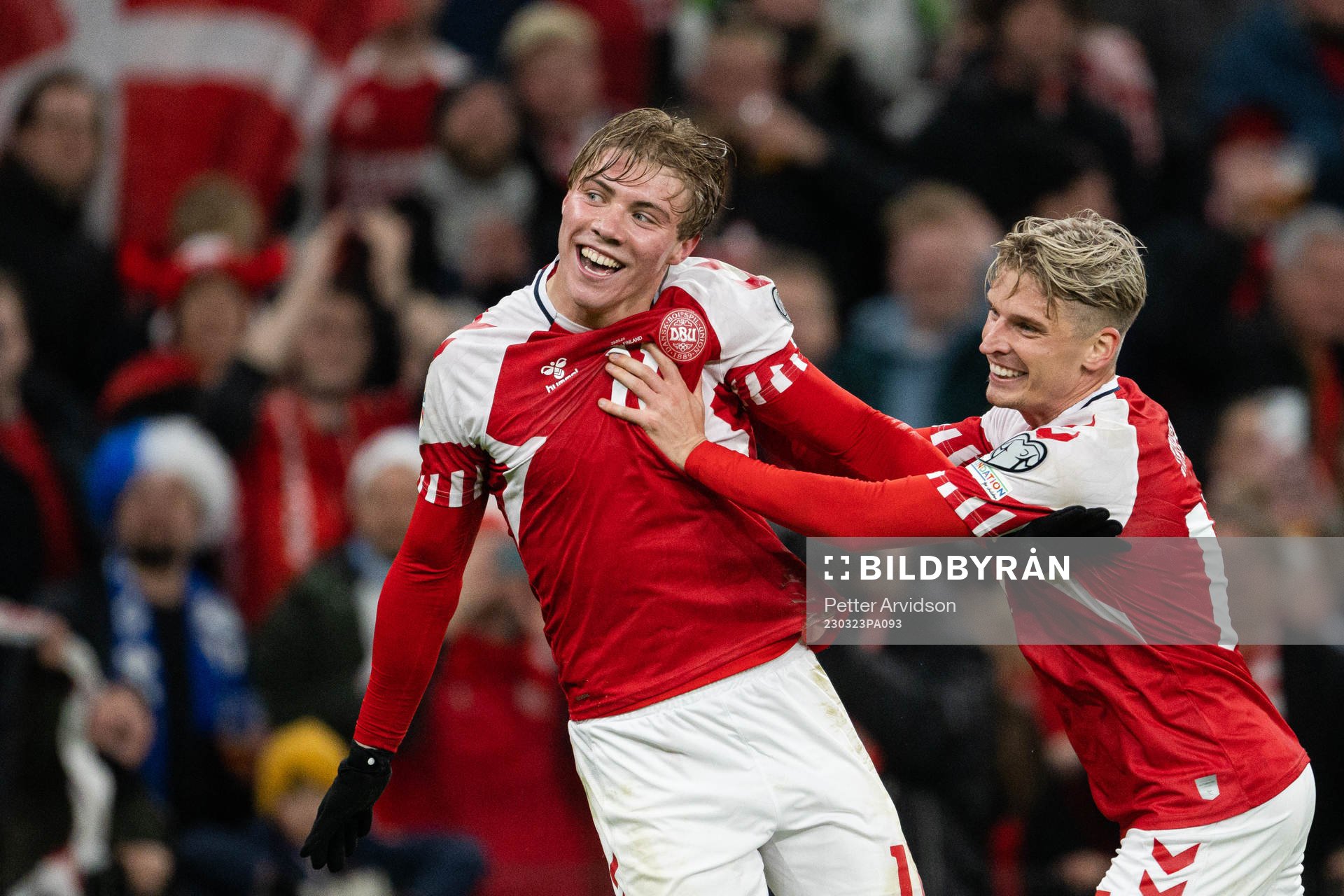 Rasmus Højlund and Jens Stryger of Denmark celebrate the