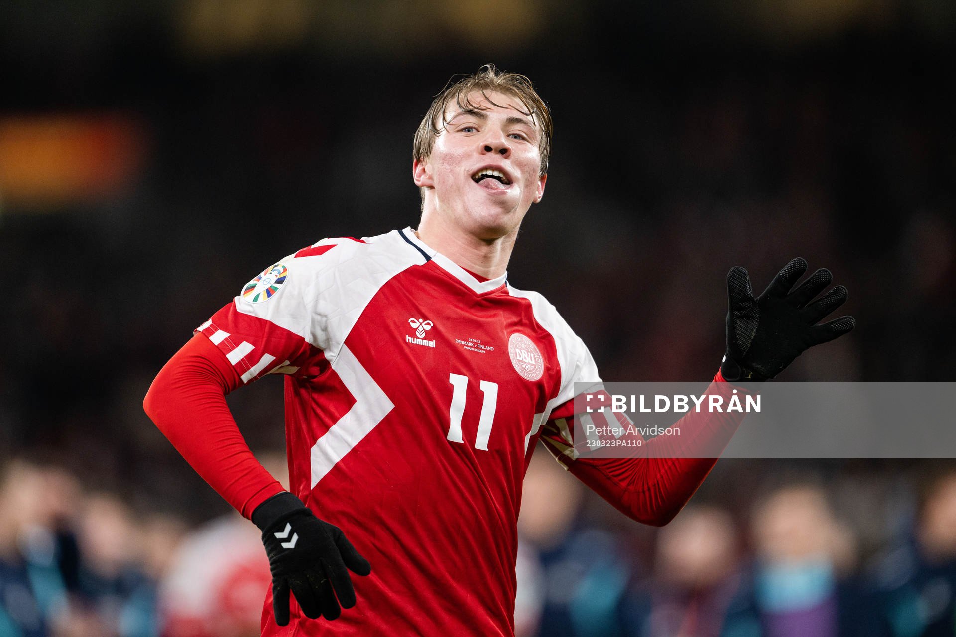 Rasmus Højlund of Denmark celebrates