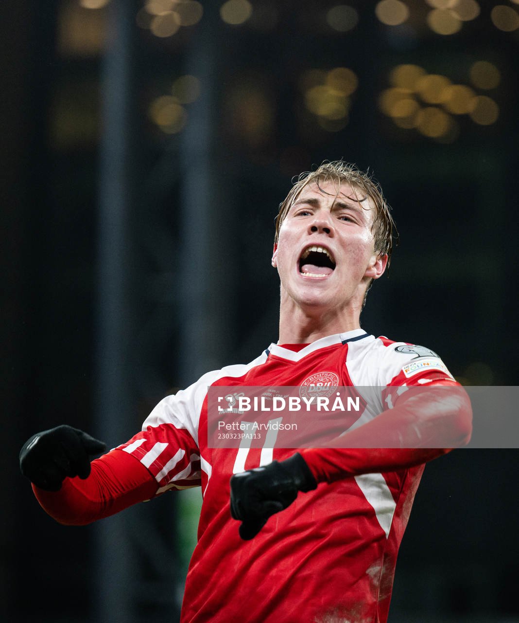 Rasmus Højlund of Denmark celebrates