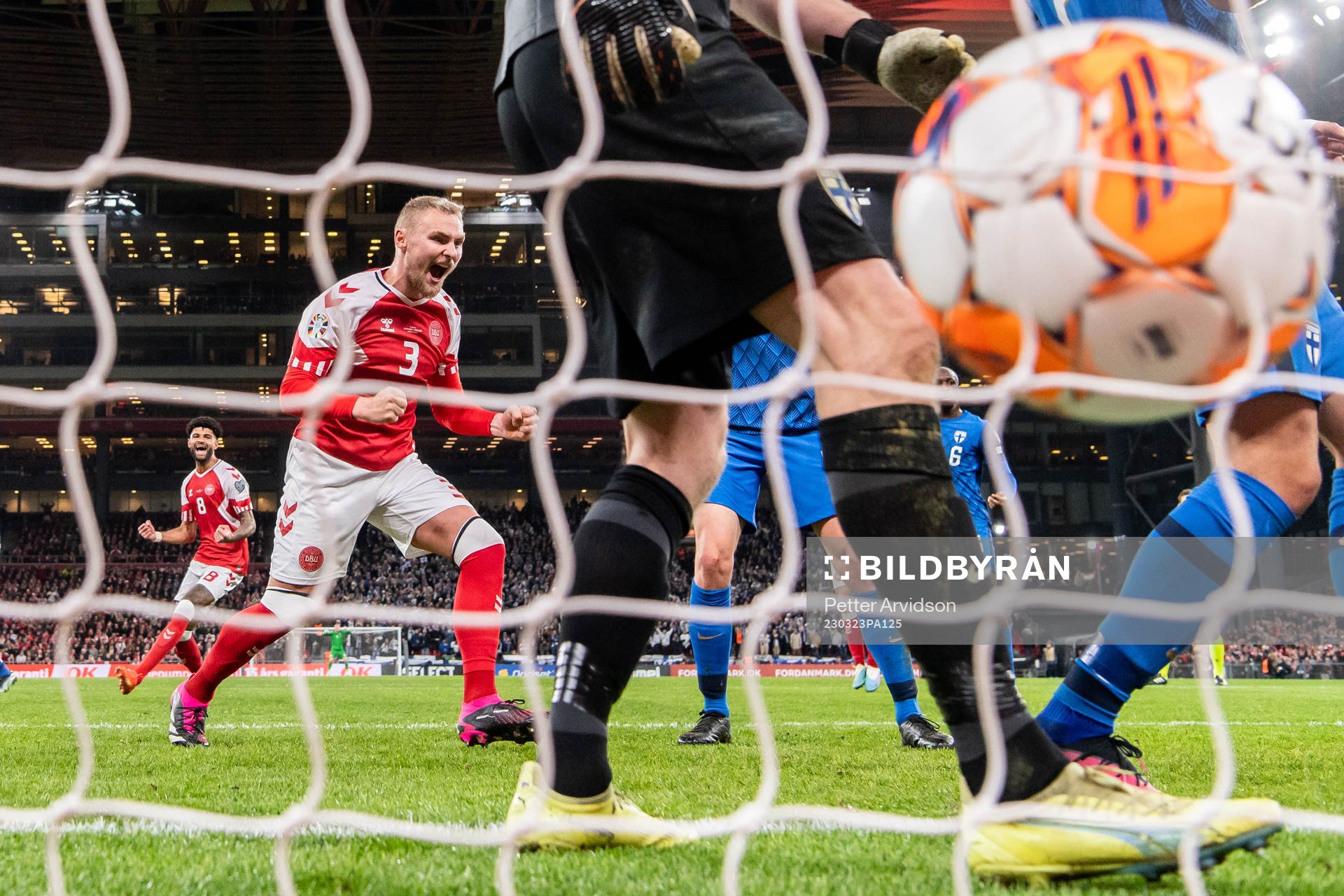 Philip Billing and Victor Nelsson of Denmark celebrate after the 2-1 goal by Rasmus Højlund (not pictured) during the UEFA Euro Qualifier football match between Denmark and Finland on March 23, 2023 in Copenhagen.