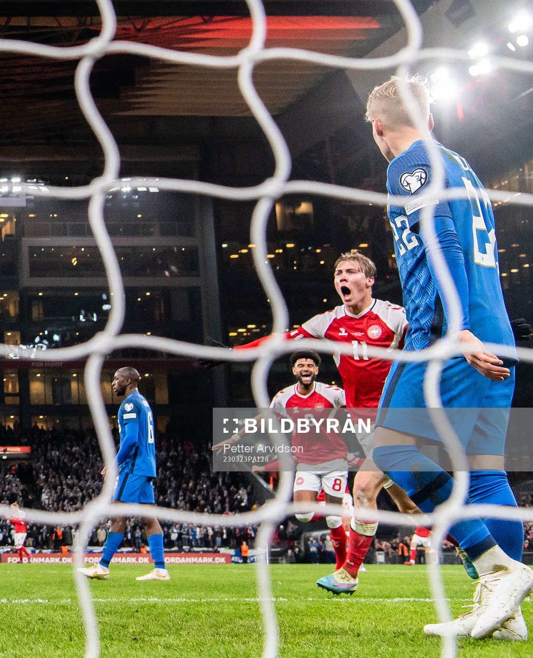 Rasmus Højlund of Denmark celebrates