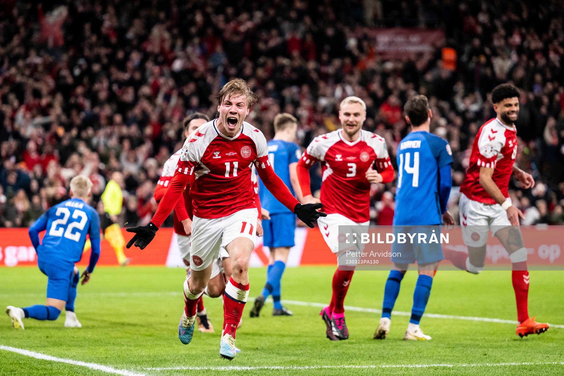Rasmus Højlund of Denmark celebrates