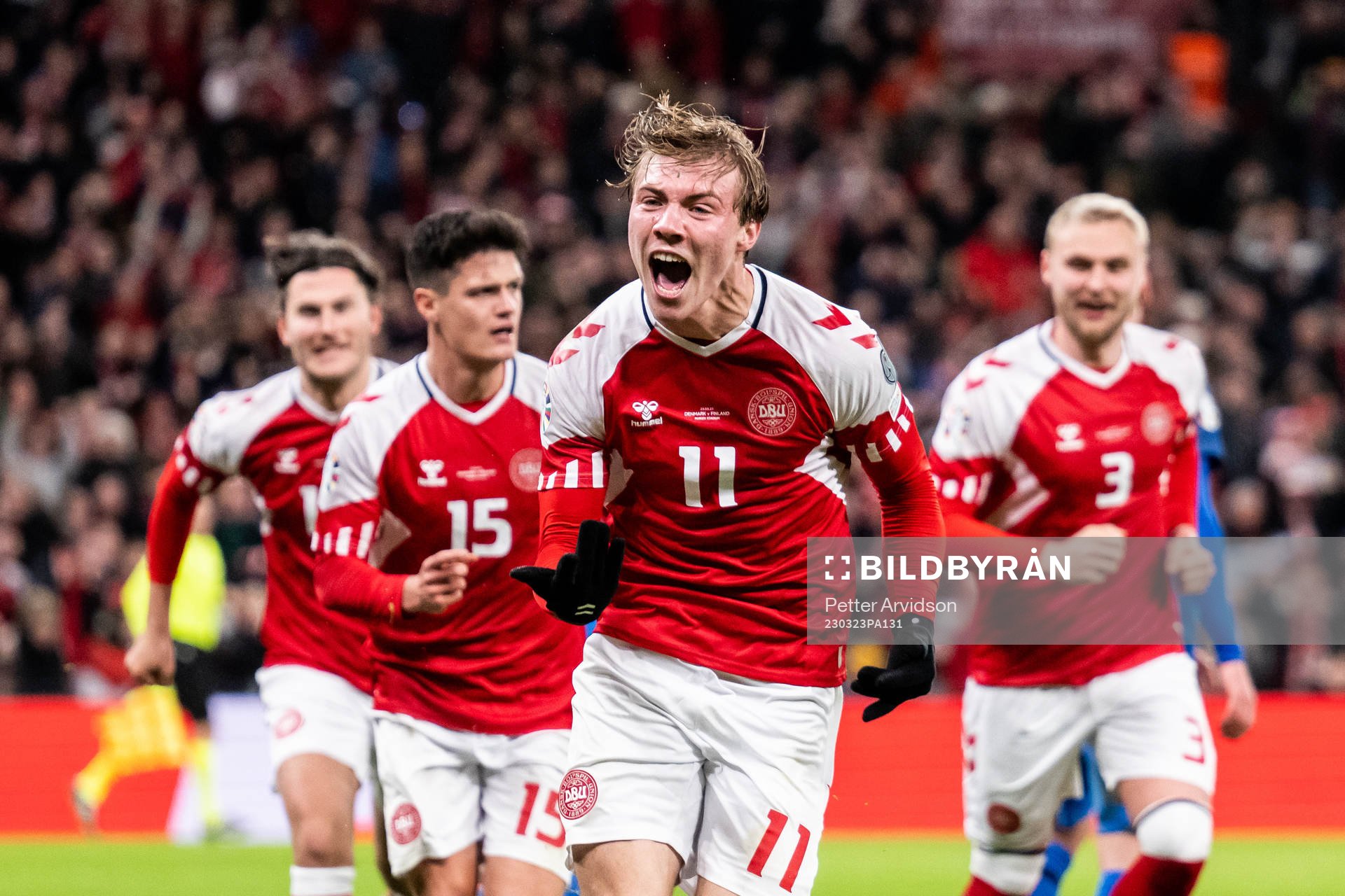 Rasmus Højlund of Denmark celebrates