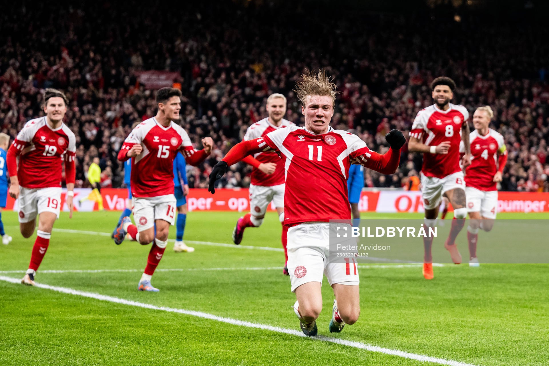 Rasmus Højlund of Denmark celebrates