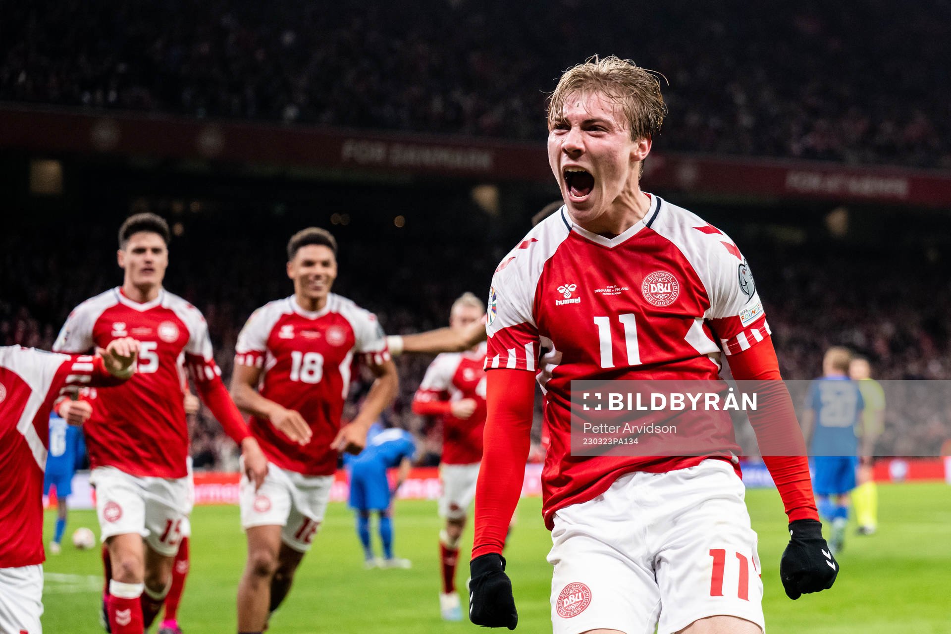 Rasmus Højlund of Denmark celebrates