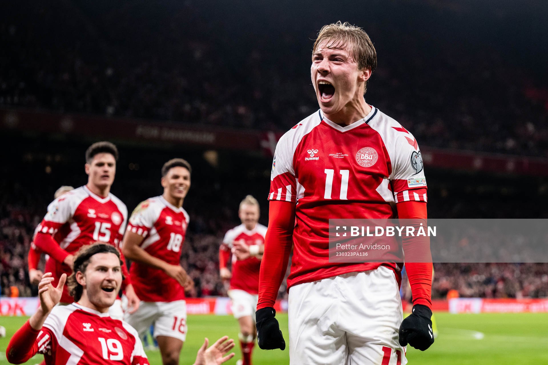 Rasmus Højlund of Denmark celebrates