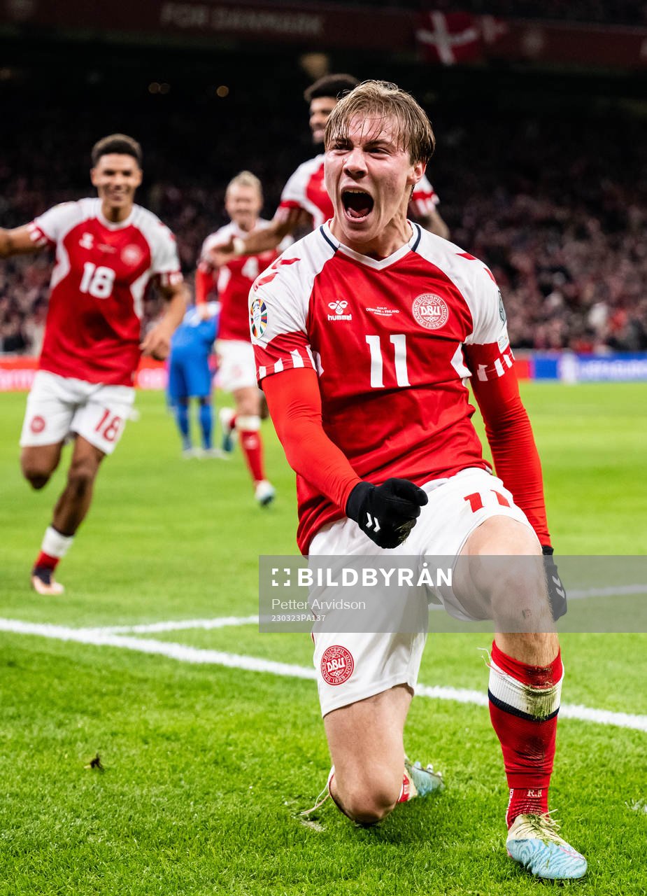 Rasmus Højlund of Denmark celebrates