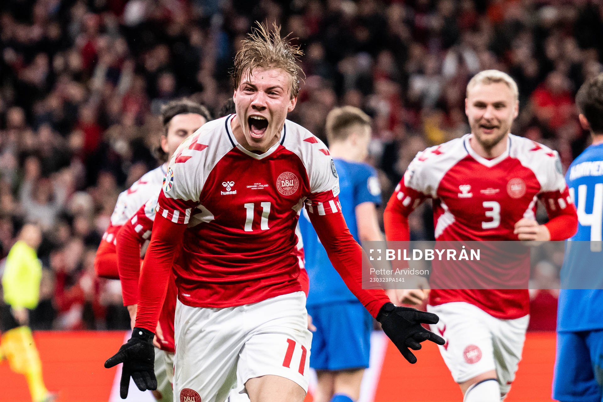 Rasmus Højlund of Denmark celebrates