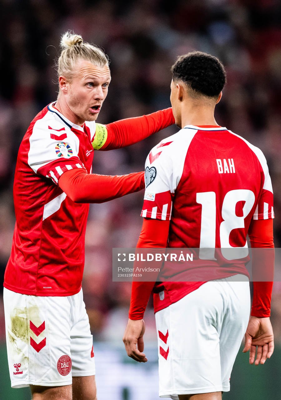 Simon Kjær and Alexander Bah of Denmark
