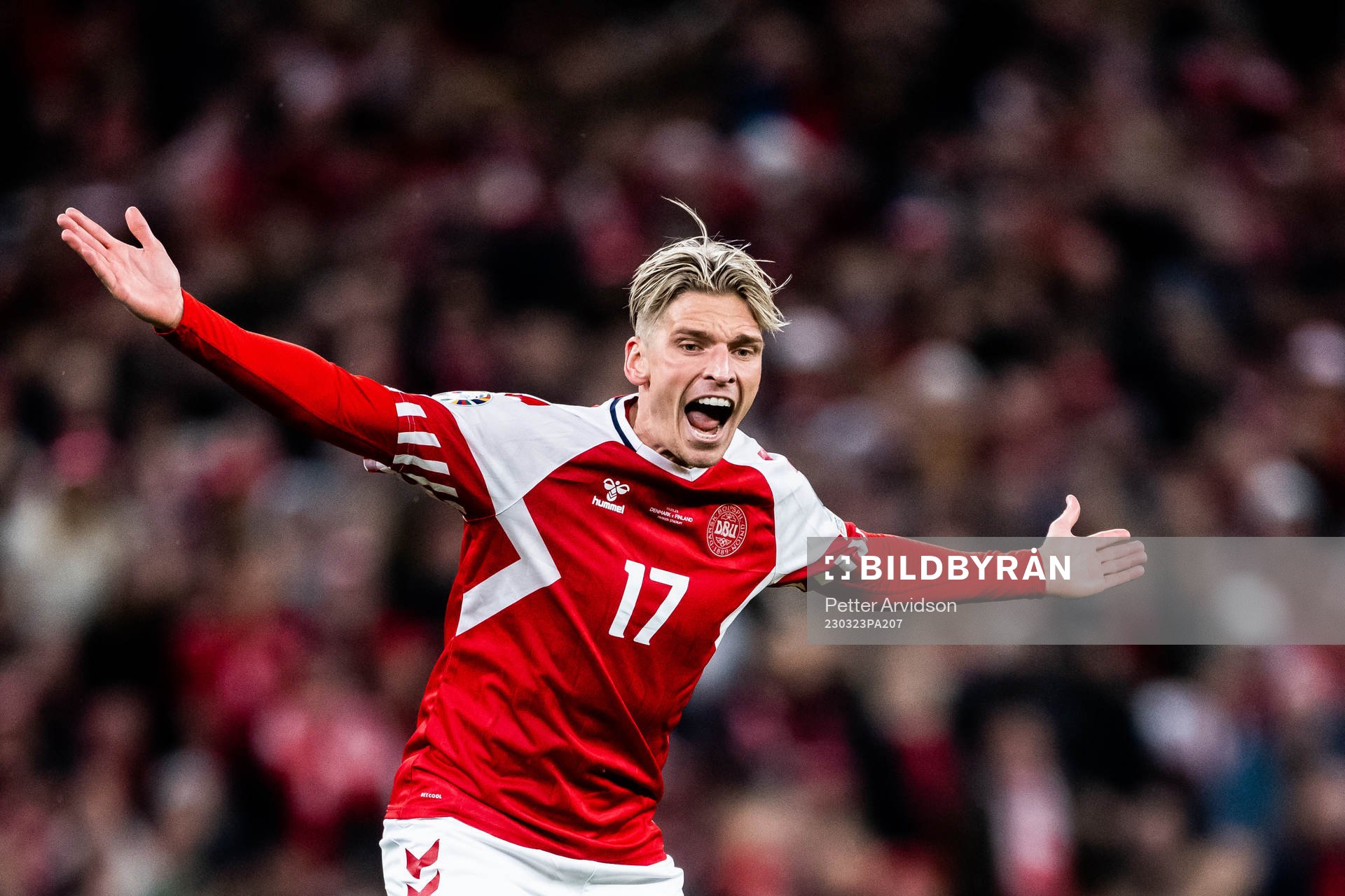 Jens Stryger of Denmark reacts