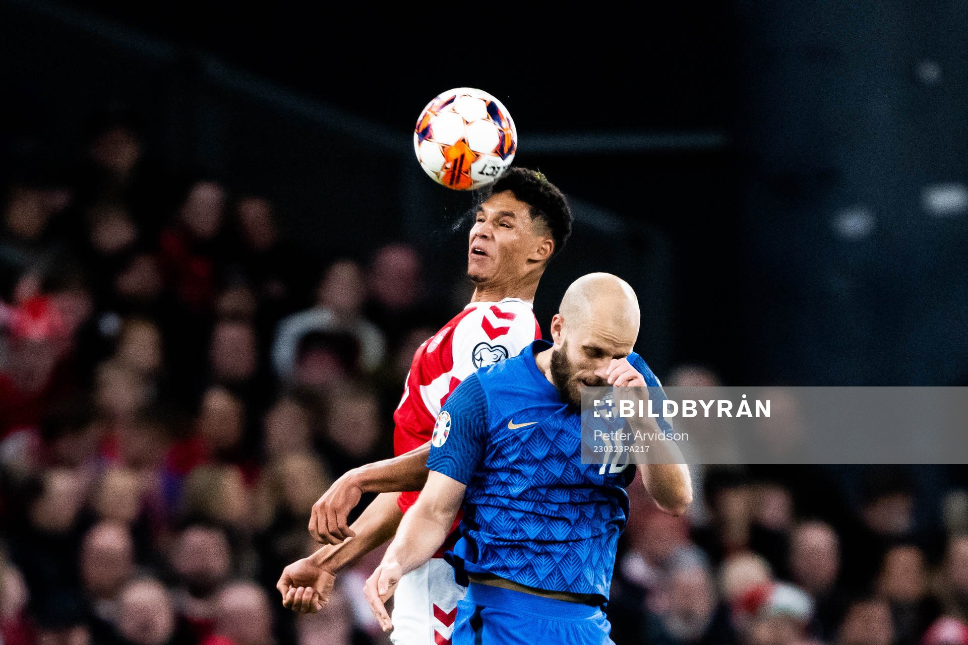 Alexander Bah of Denmark and Teemu Pukki of Finland during the UEFA Euro Qualifier football match between Denmark and Finland on March 23, 2023 in Copenhagen. 