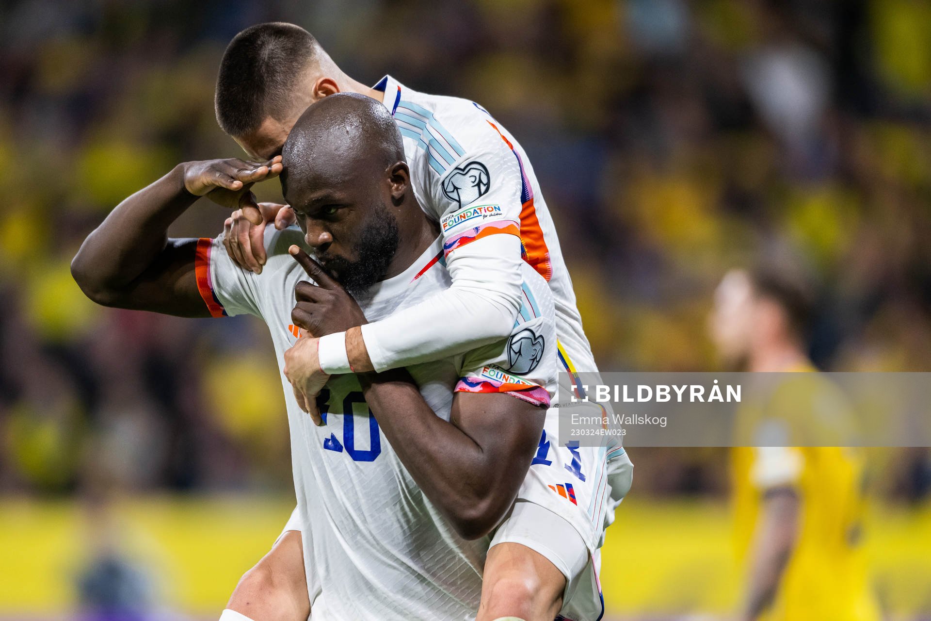 Romelu Lukaku of Belgium celebrates with Yannick Carrasco